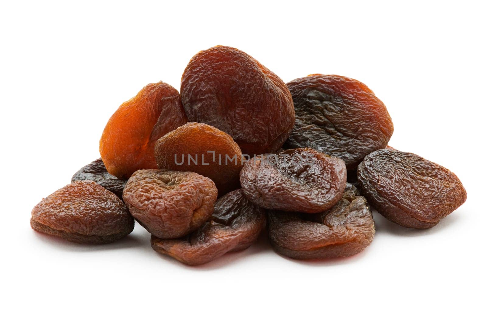 Group of dried natural Apricots isolated on white