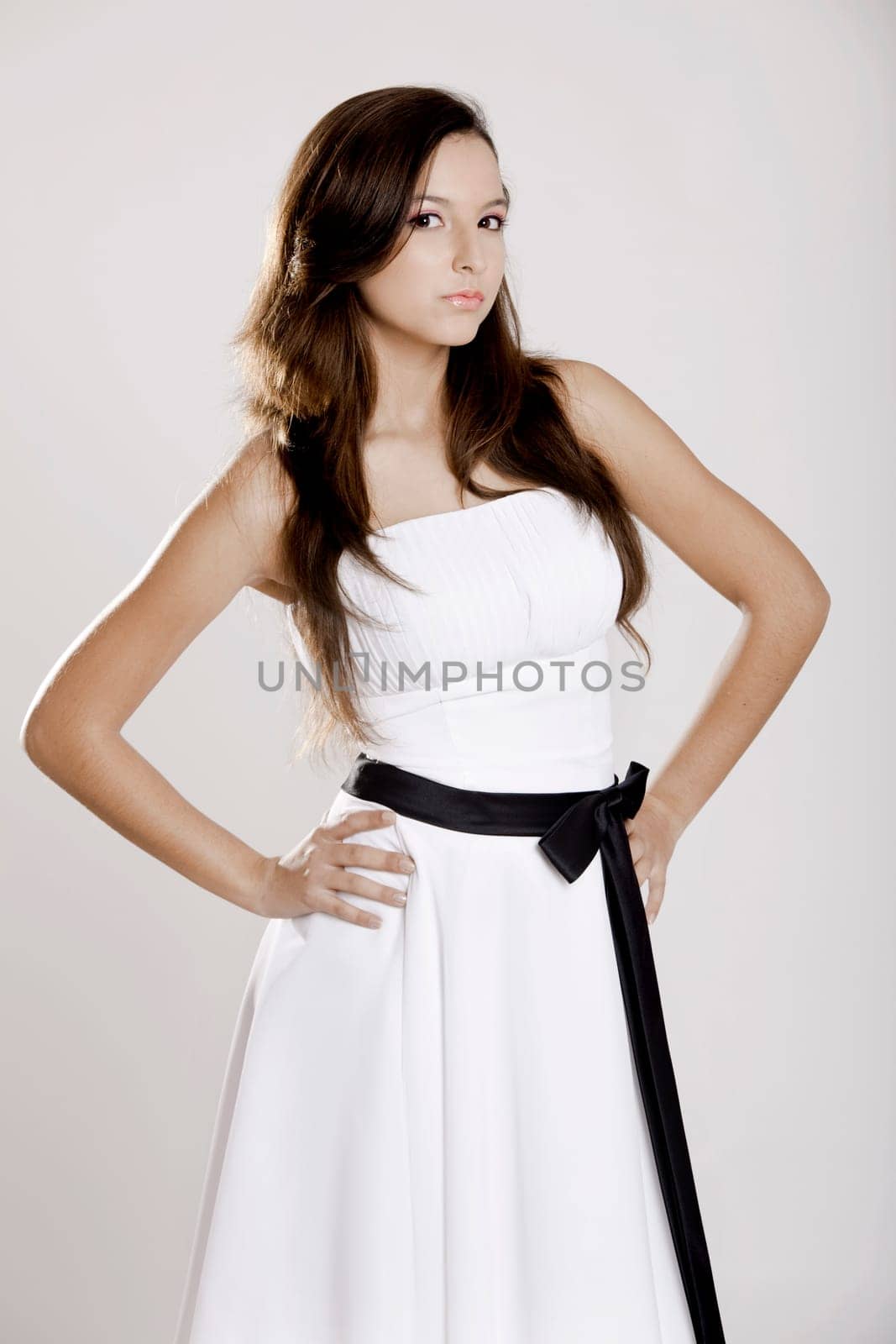 Beautiful and sexy woman wearing a wonderful white dress