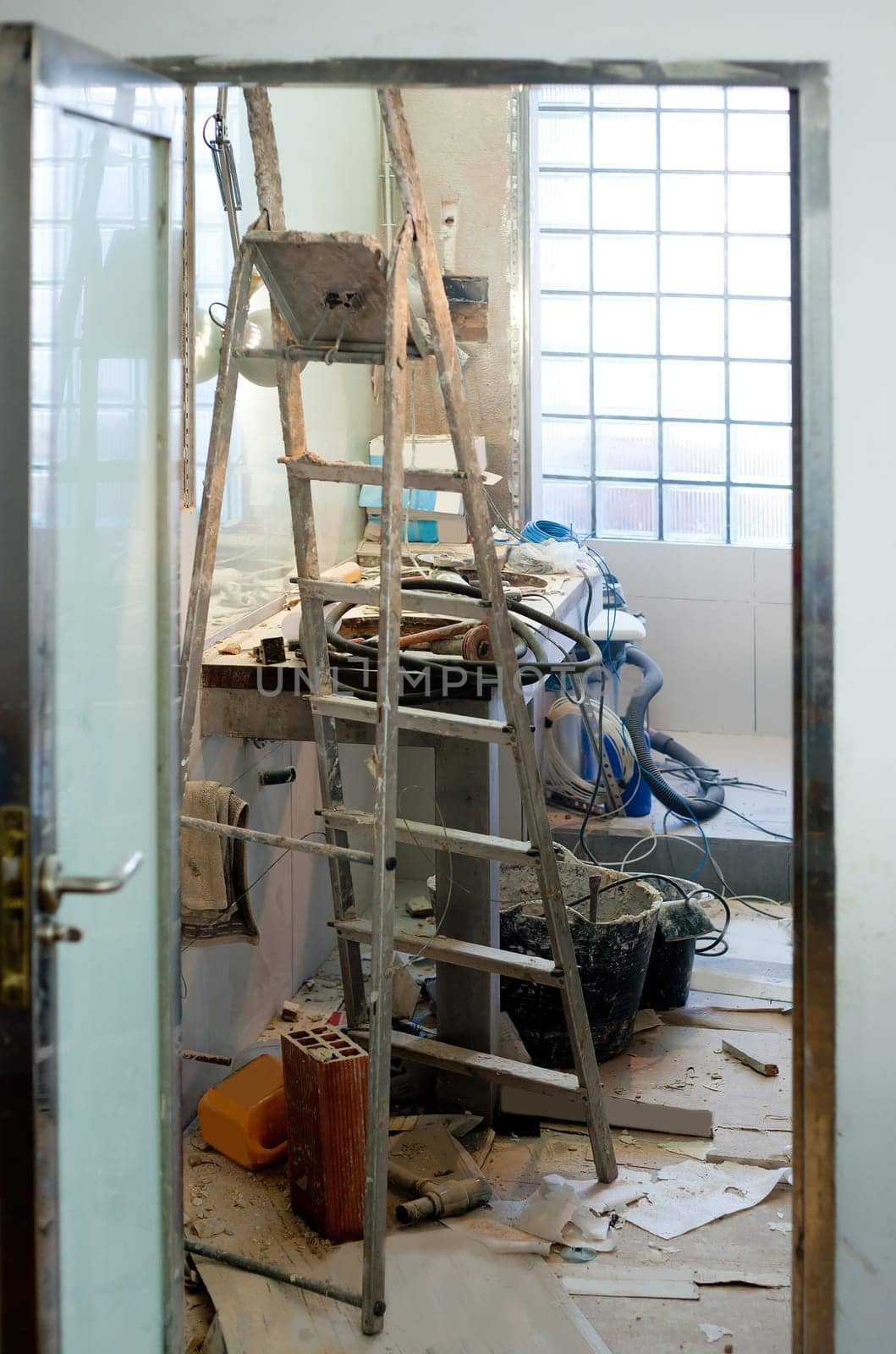 bathroom improvement repair with messy clutter and dust in tools