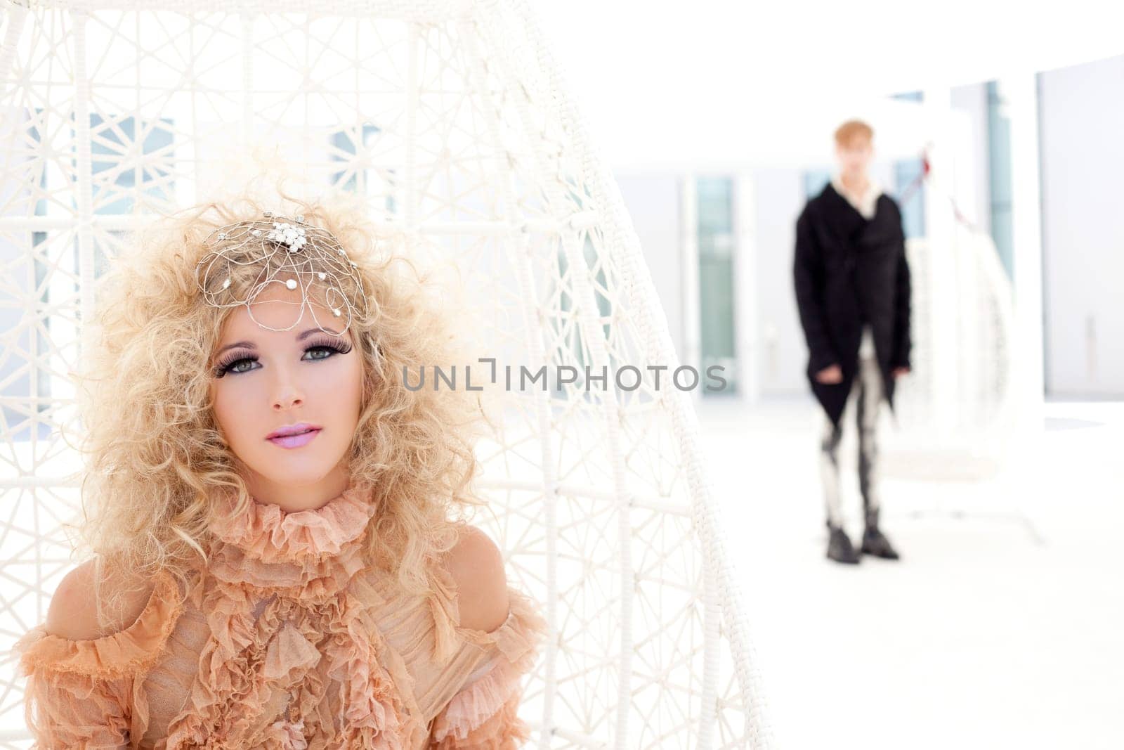 Baroque couple portrait with vintage vampire inspiration in hammock terrace