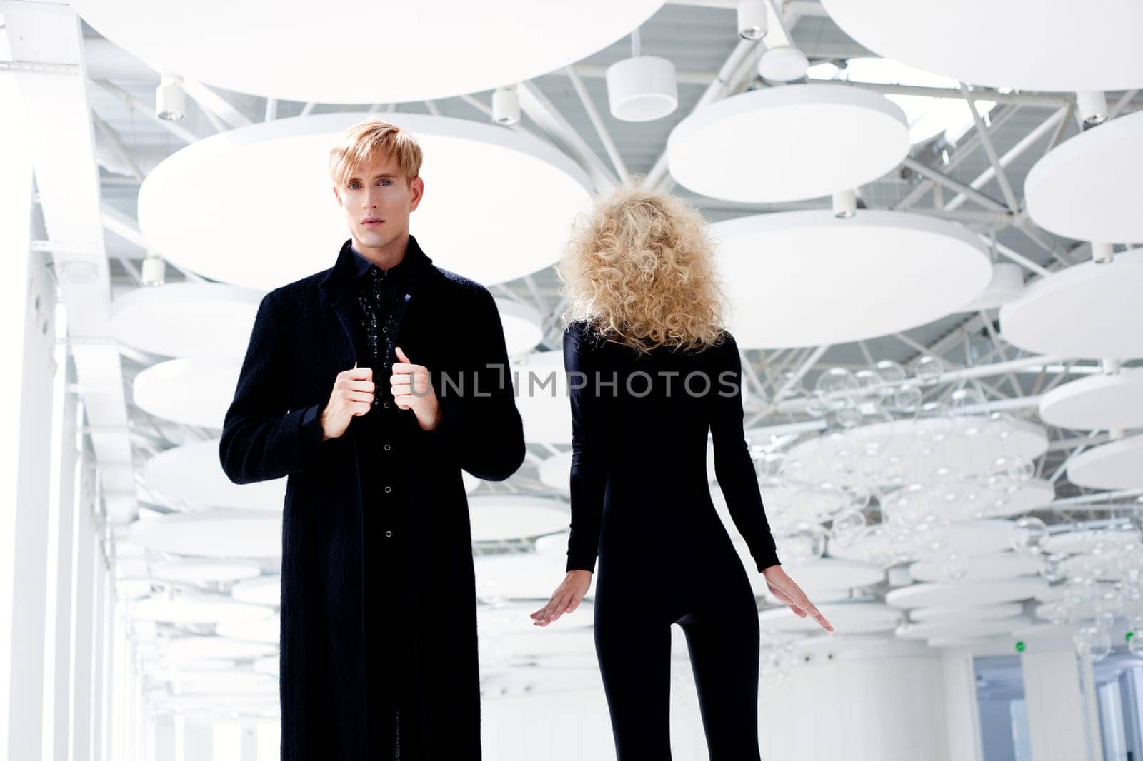 Blond couple classic movie secret agent and sexy girl in black