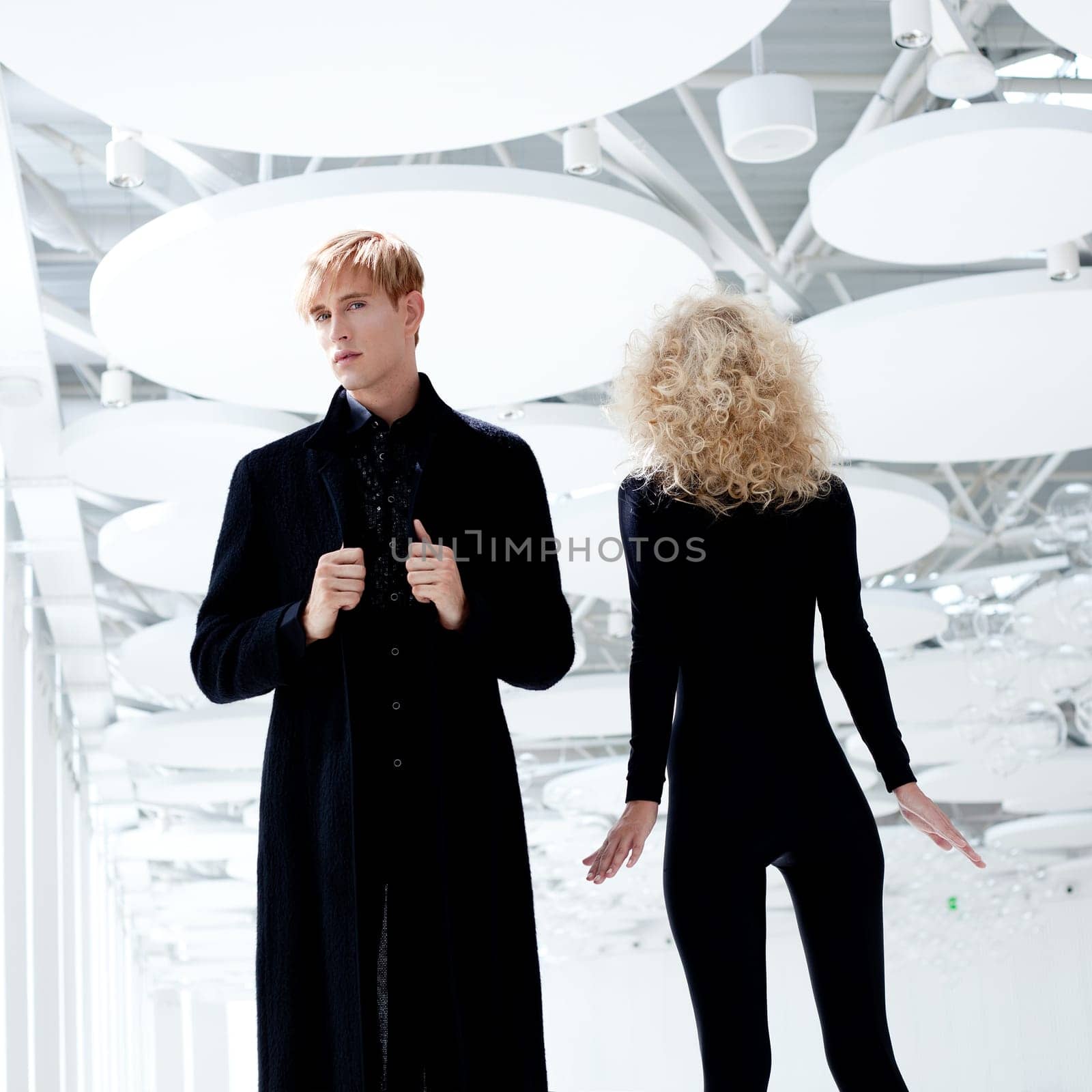 Blond couple classic movie secret agent and sexy girl in black