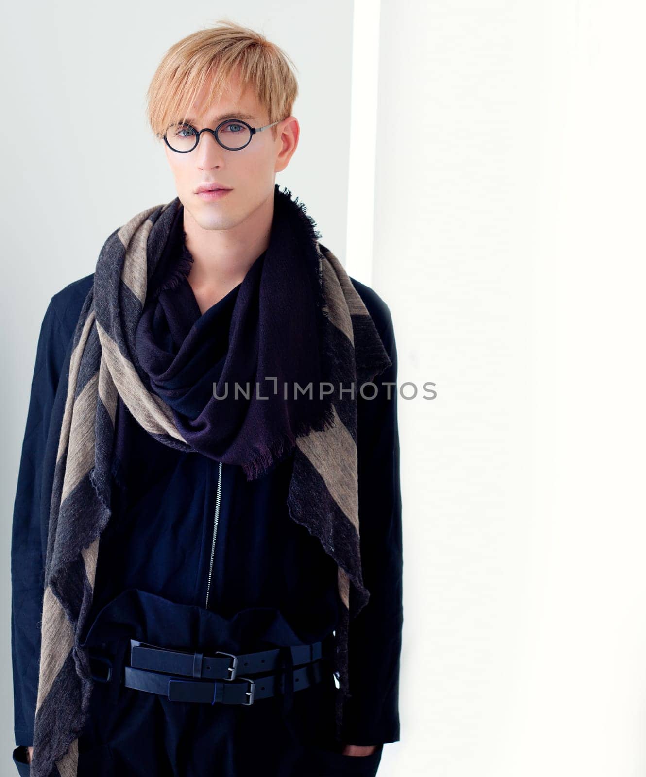blond modern handsome student man with nerd glasses portrait