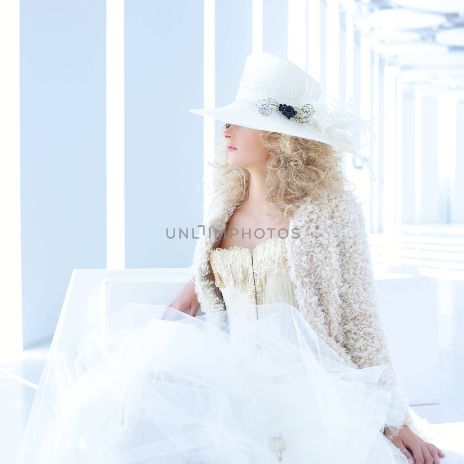 blond fashion woman with eighteenth century corset haute couture