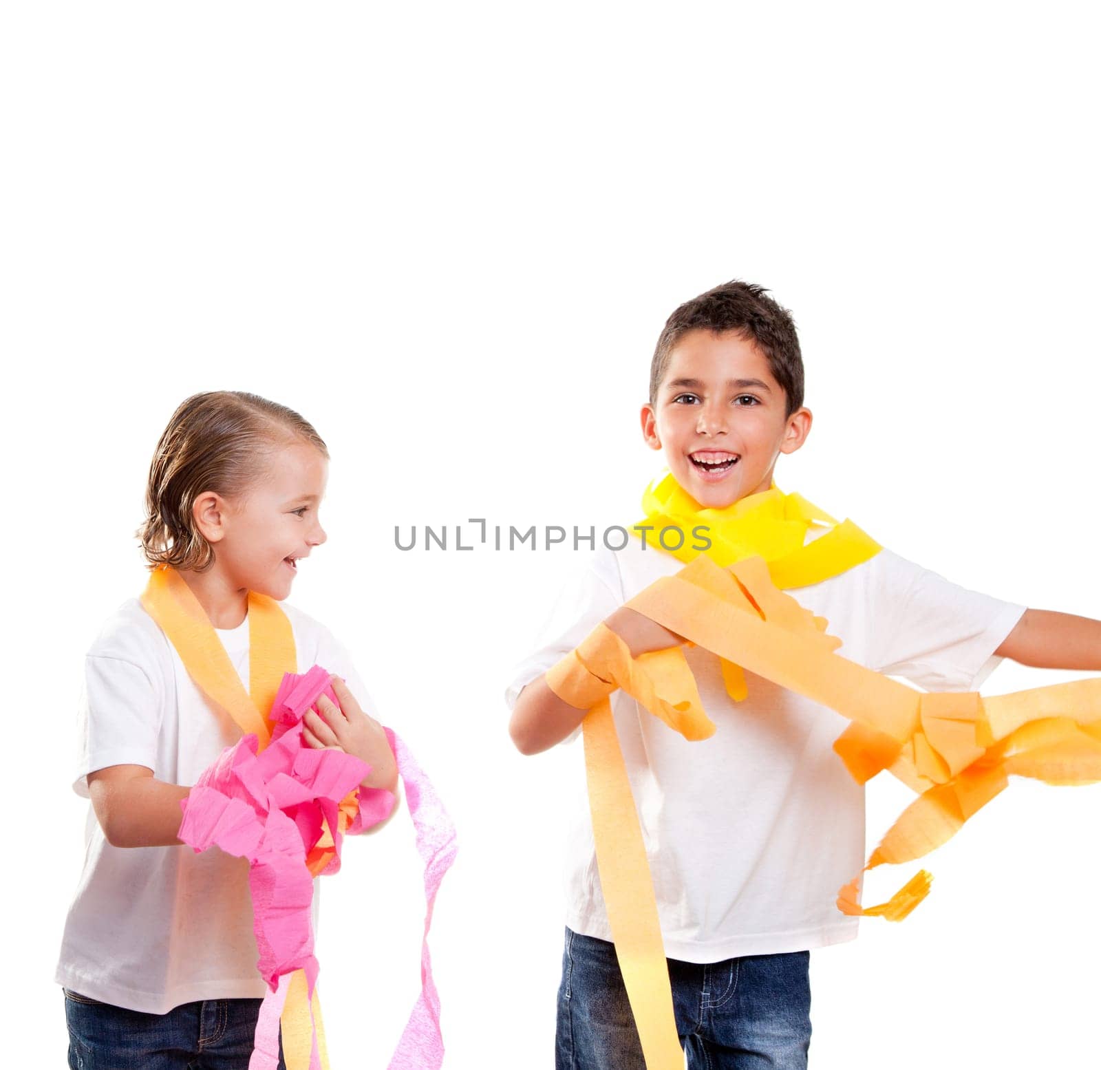two children kids in a party with messy colorful paper ribbon