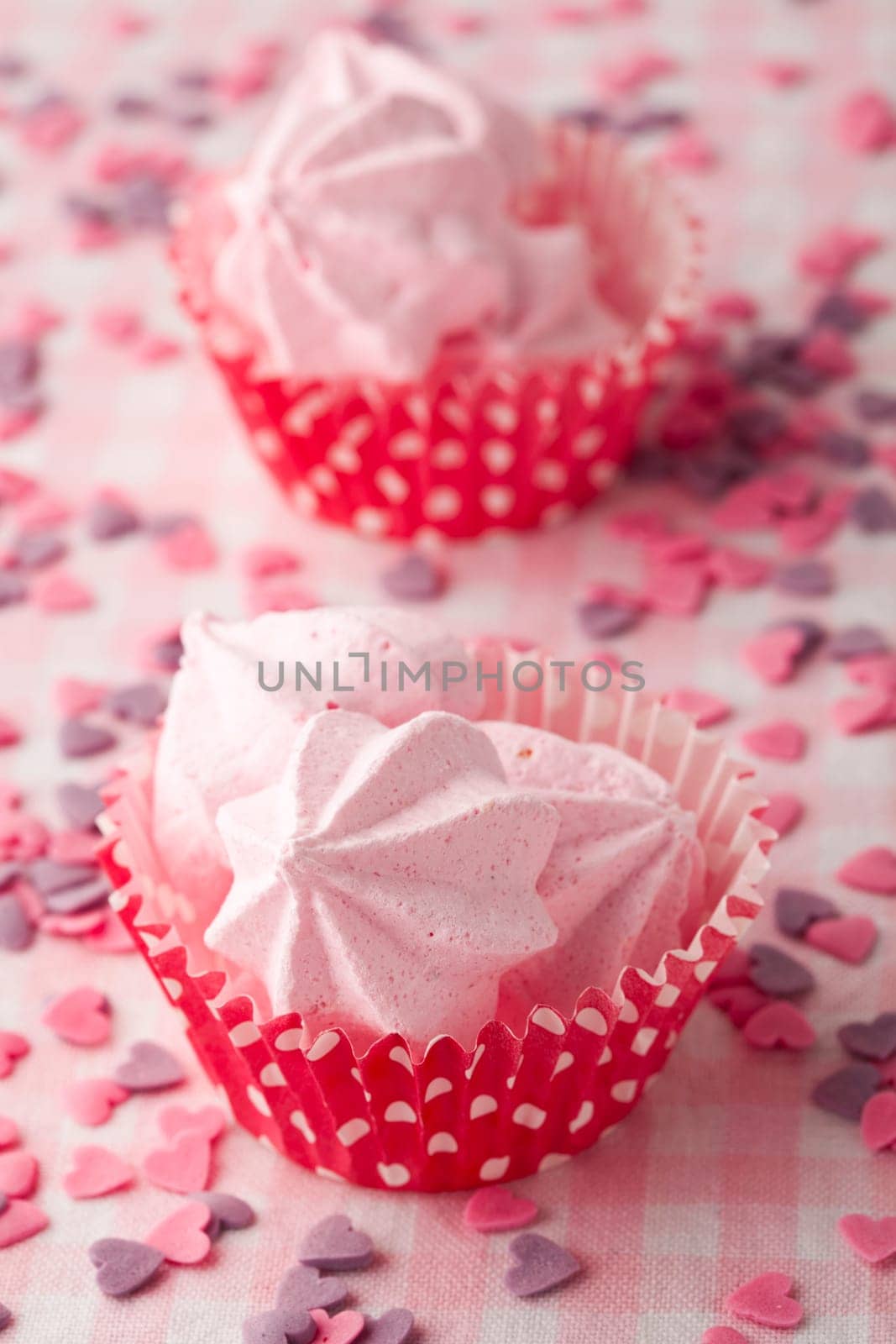 Close-up of delicious pink meringue. Studio shot.