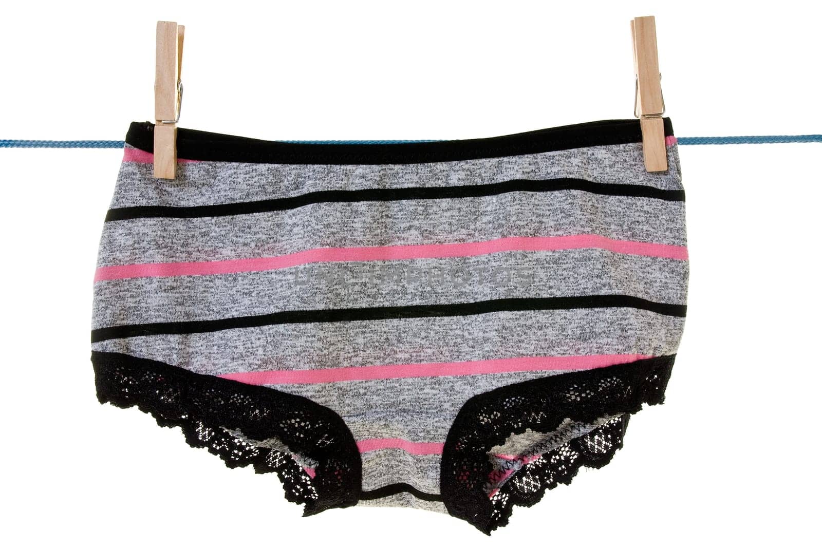 panties hung on the clothes line. isolated on white background
