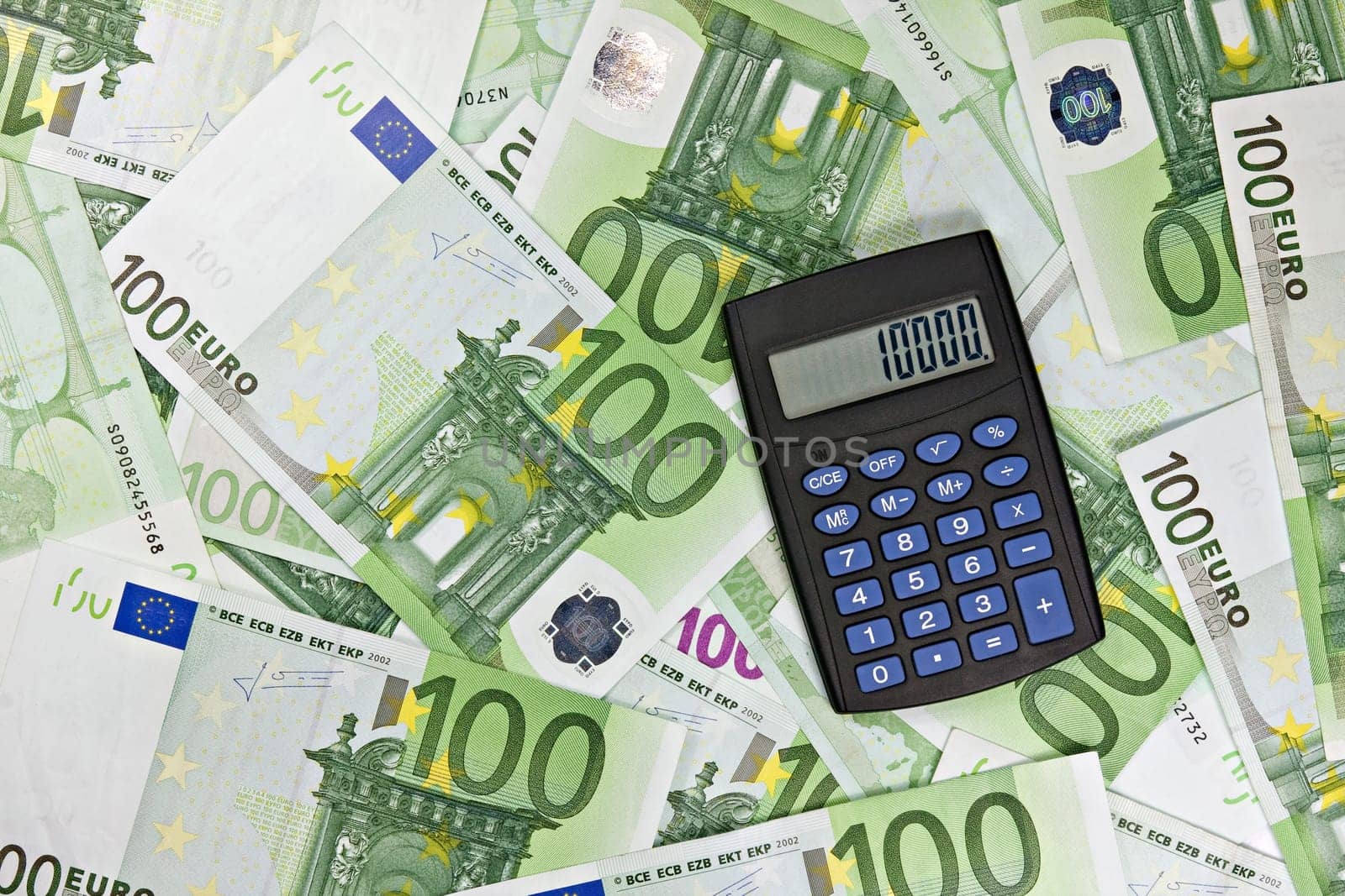 banking concept . black calculator and euro currency