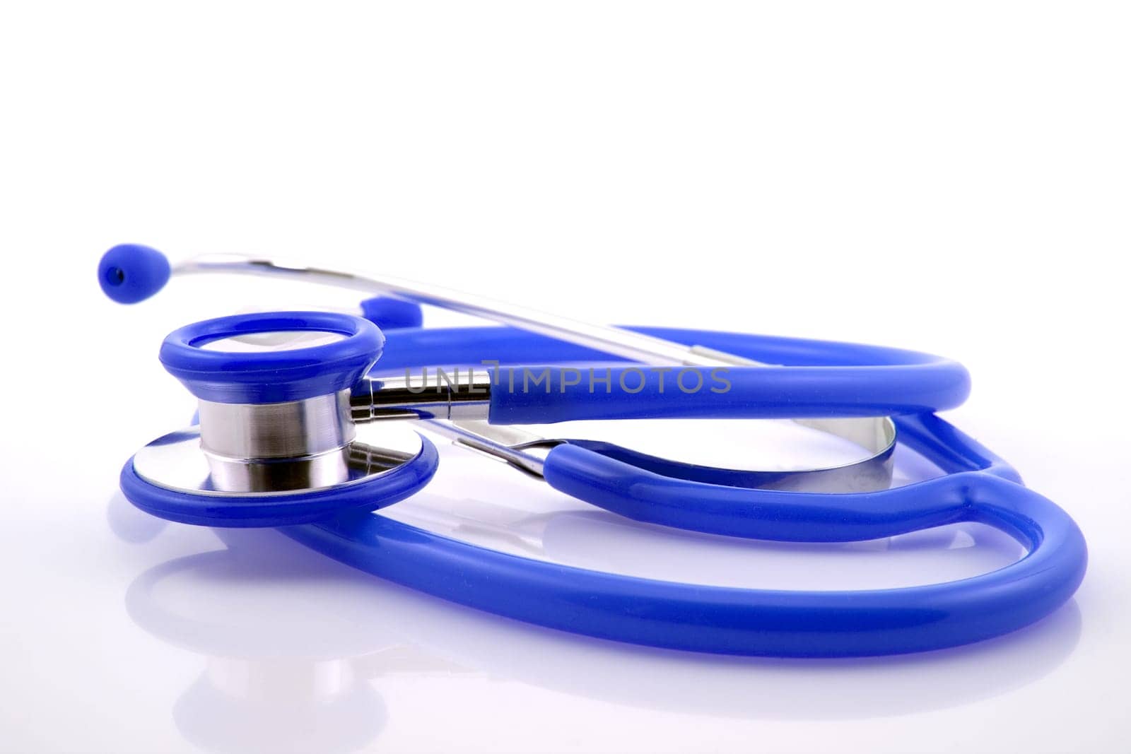 blue medical stethoscope on a white background