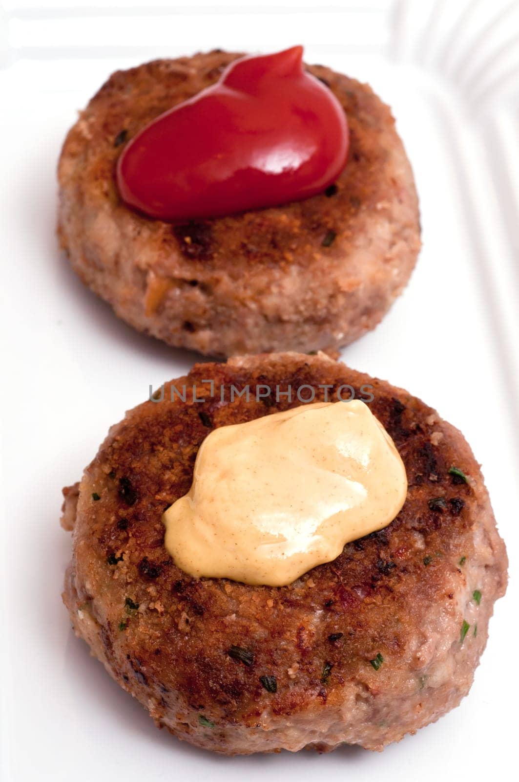Meatballs with hot mustard and ketchup