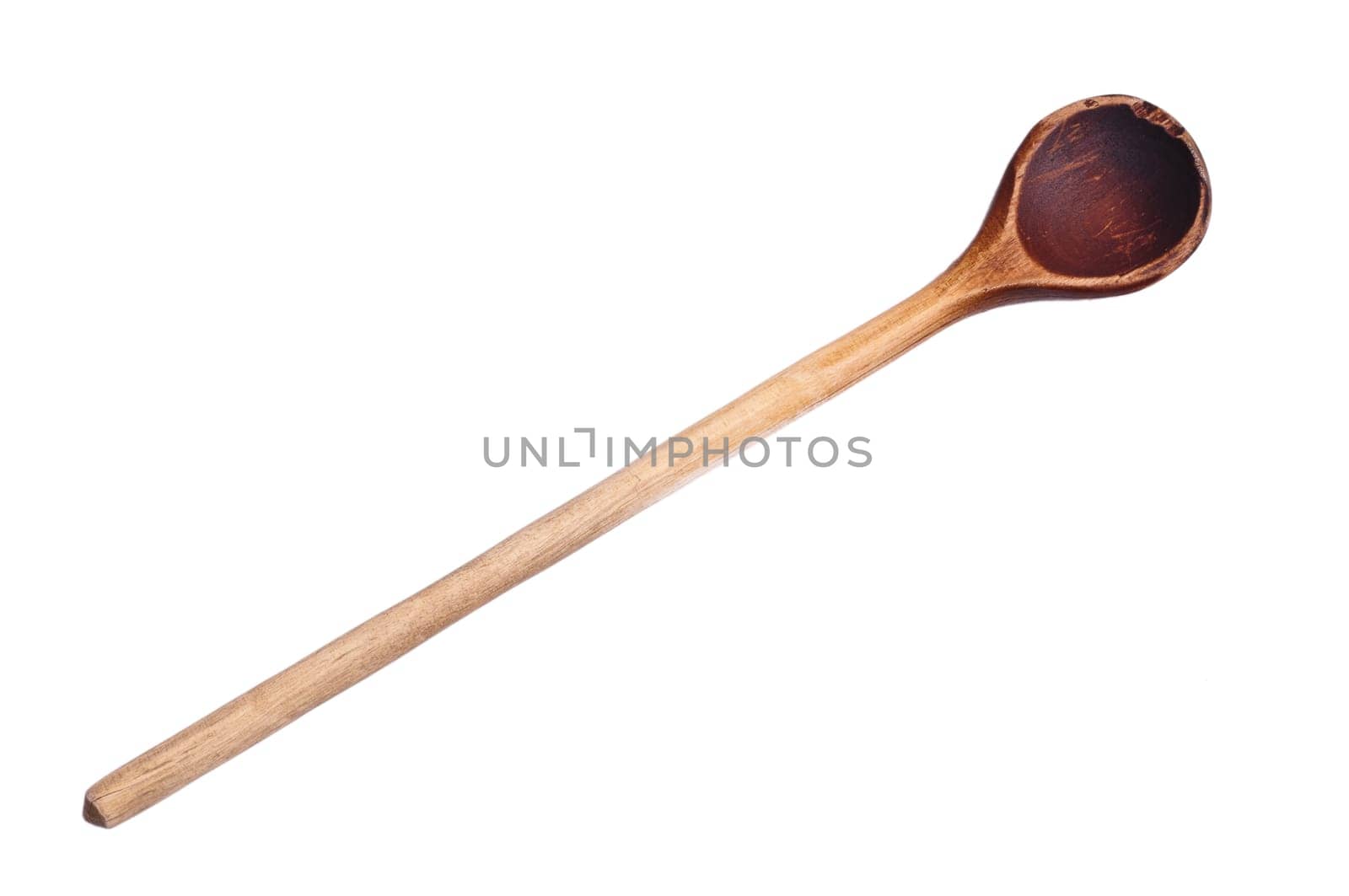 An old used wooden wooden spoon cut out