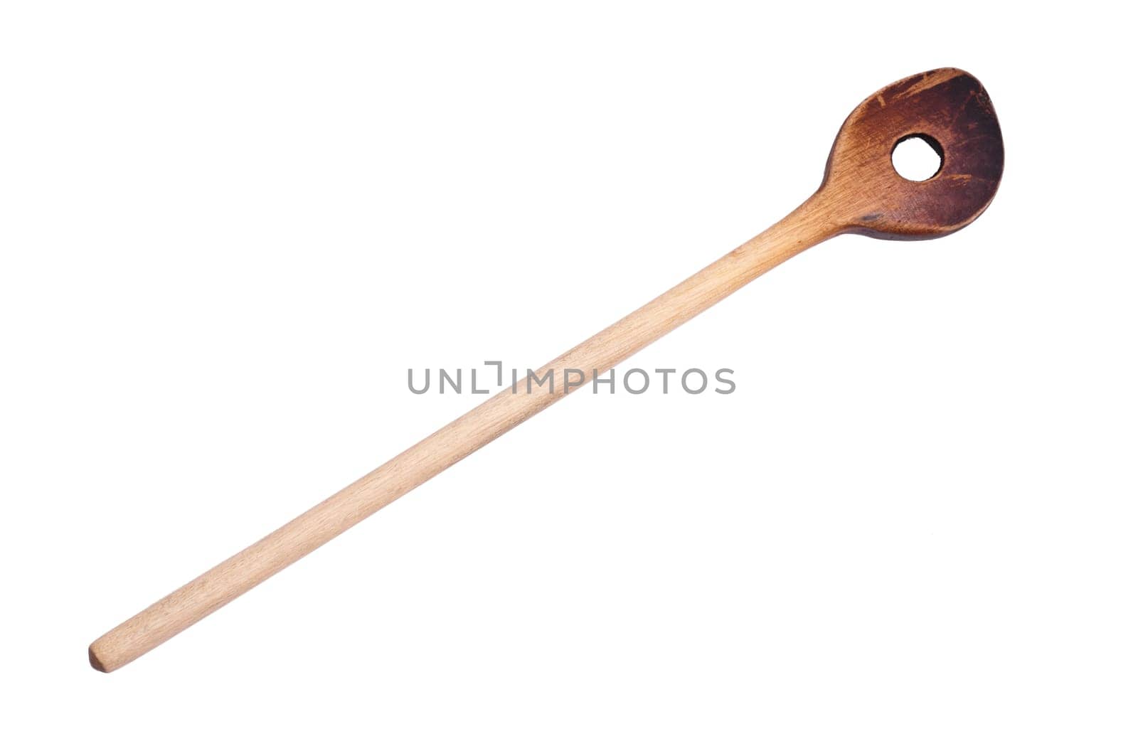 An old used wooden wooden spoon cut out