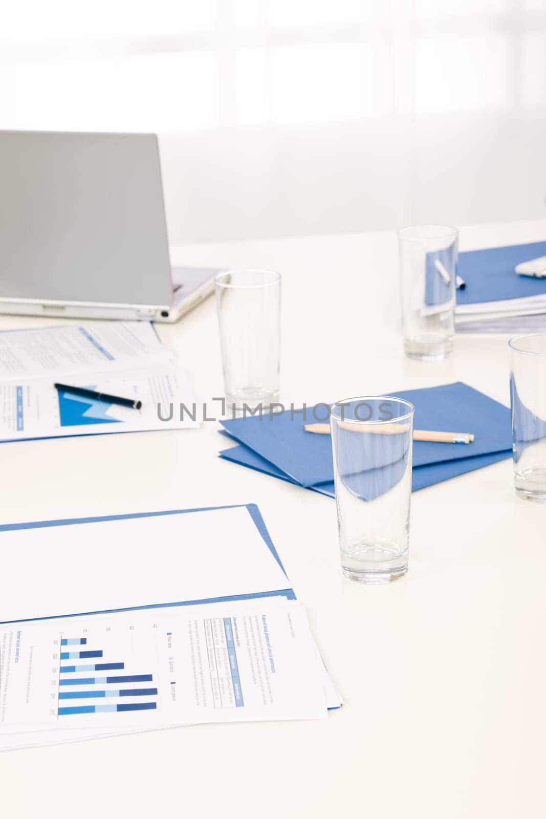 Office supply on table before successful sales business meeting