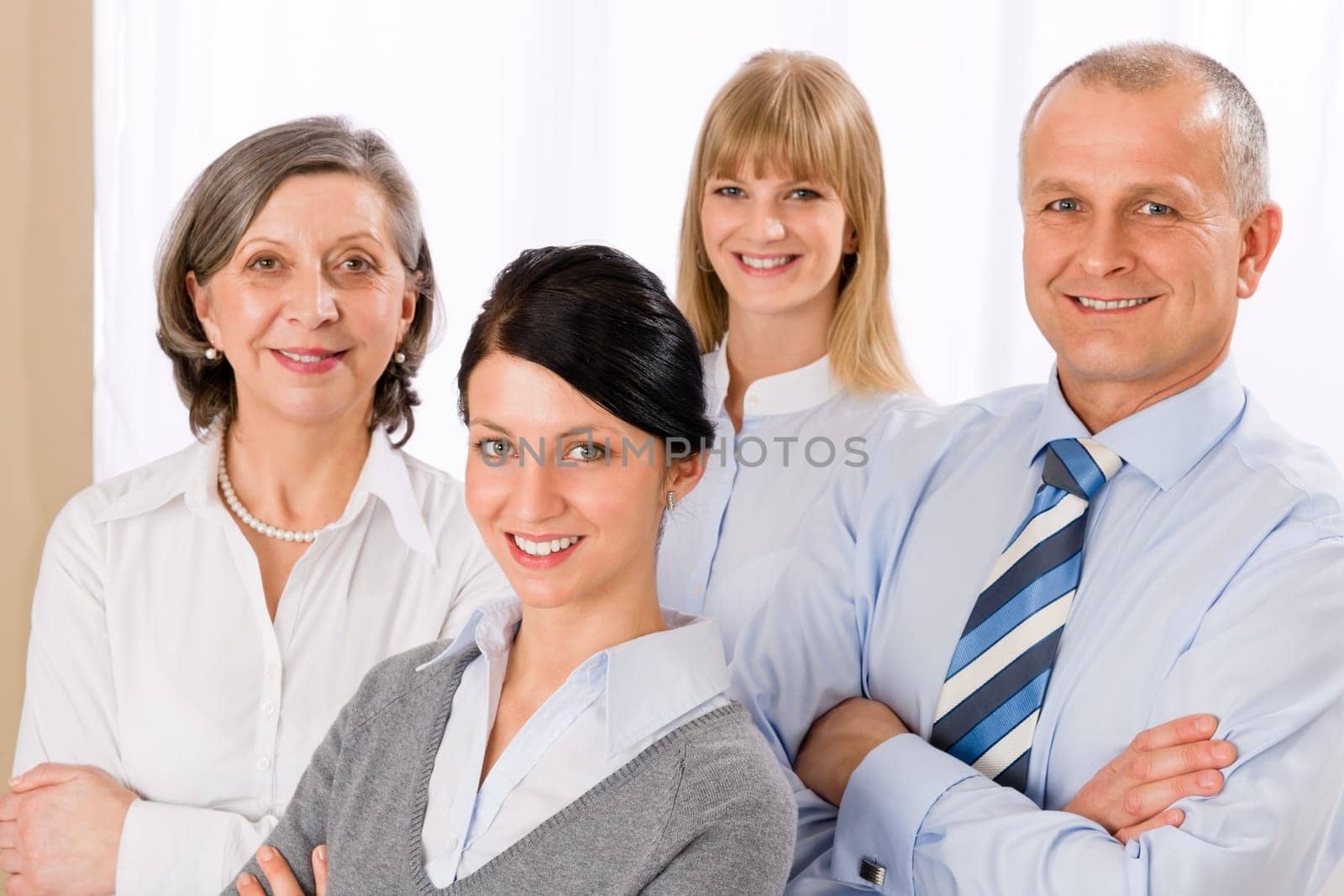 Confident business team smiling portrait successful professionals