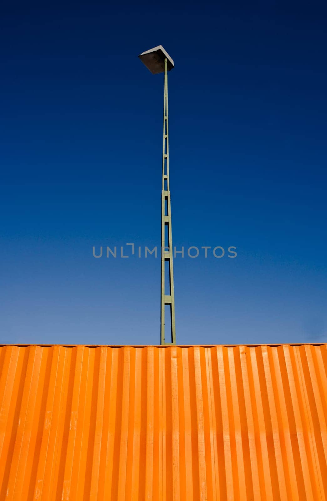Orange Cargo Container towards blue sky