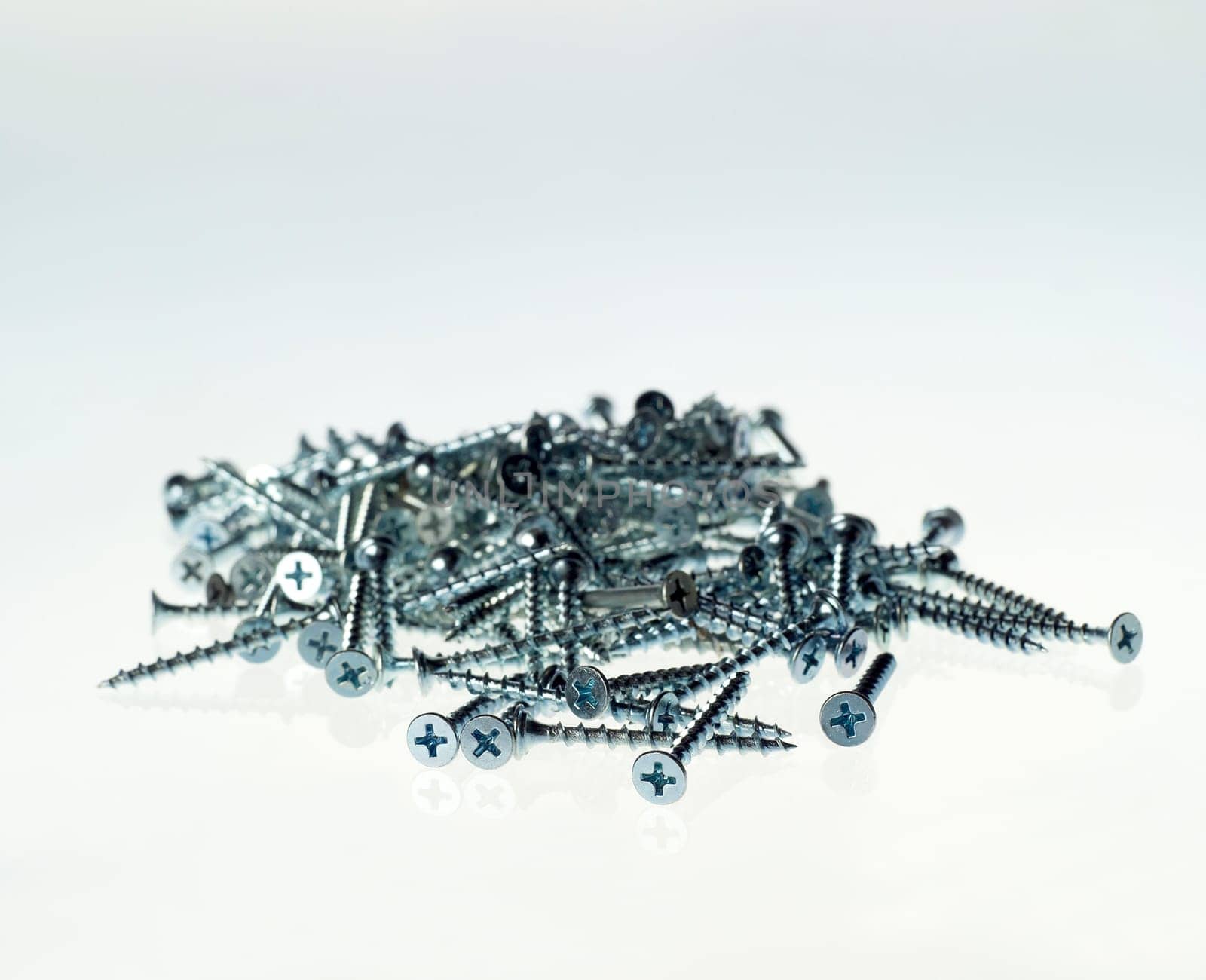 Stack of screws isolated on white background