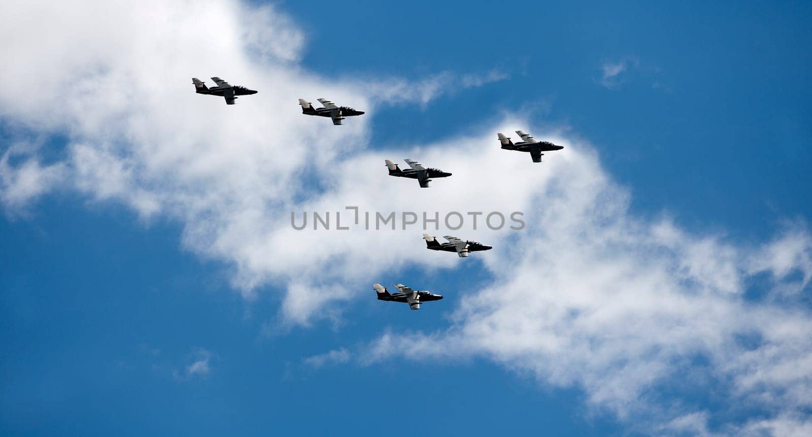 Formation of Military Airplanes on blue sky