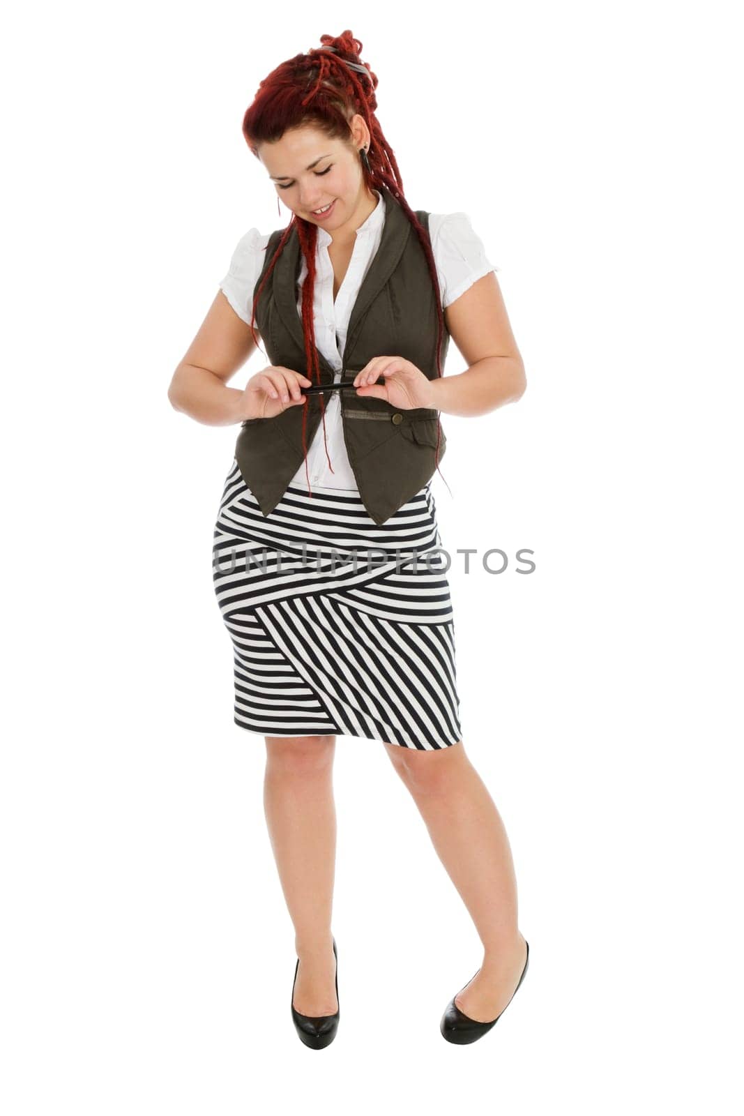 Modern beautiful girl with pen in striped skirt isolated on white background