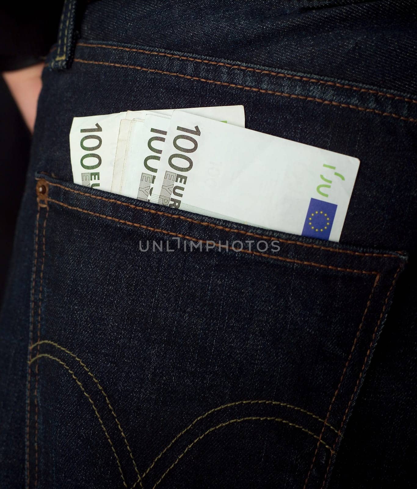 100 Euro Bank notes in a jeans pocket