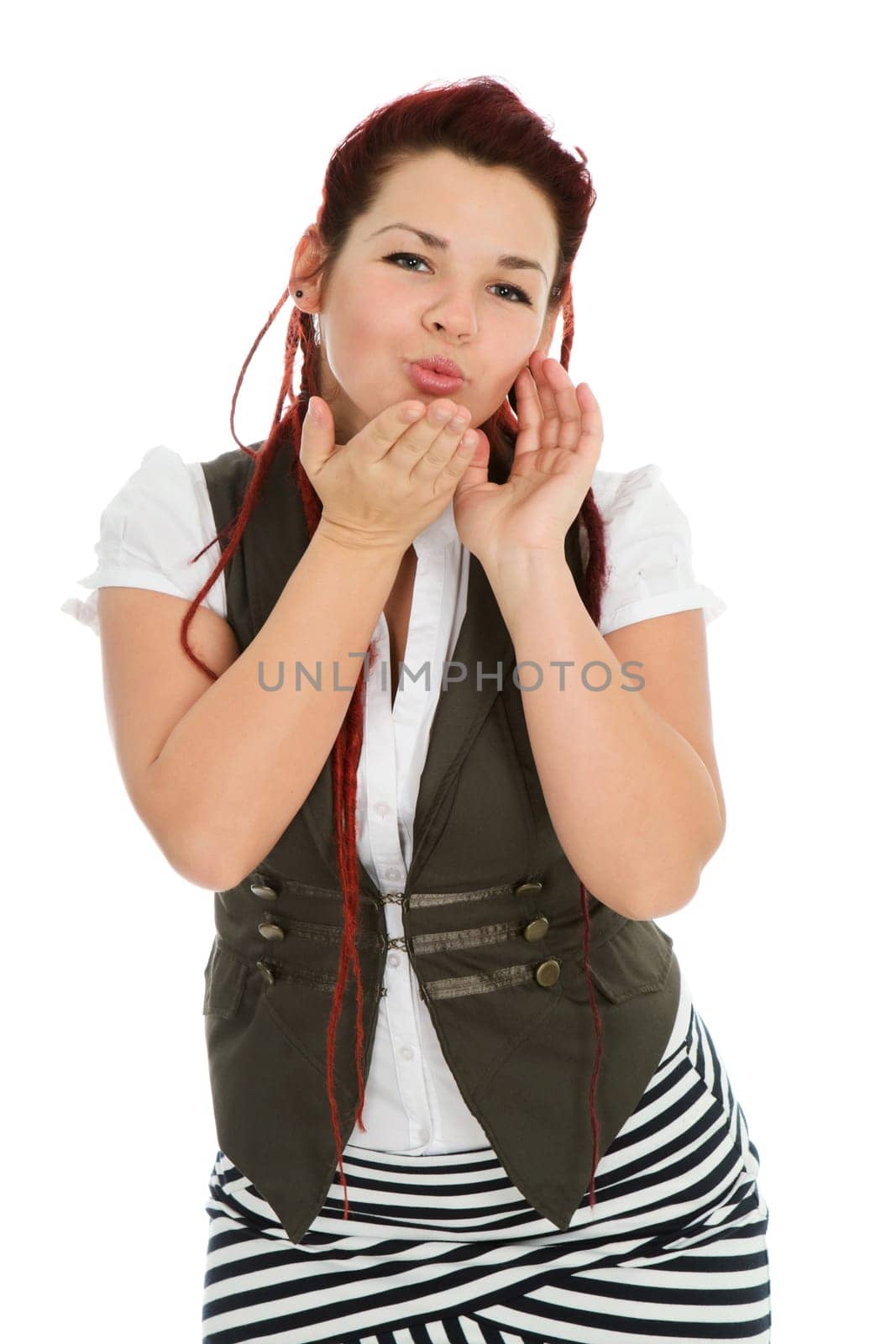 Young beautiful woman sending kiss isolated on white background