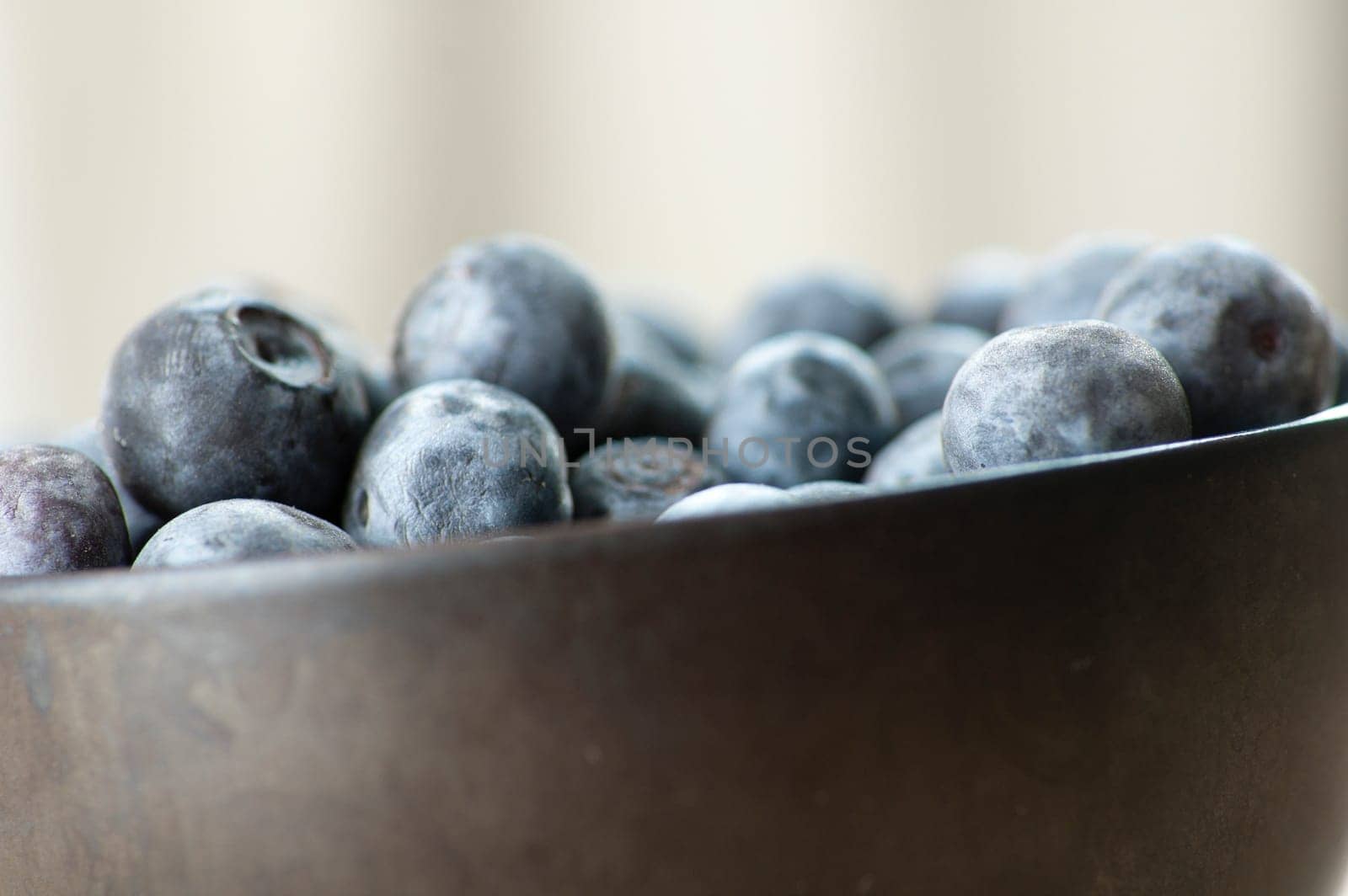 Close up of Blueberries in a bowl.