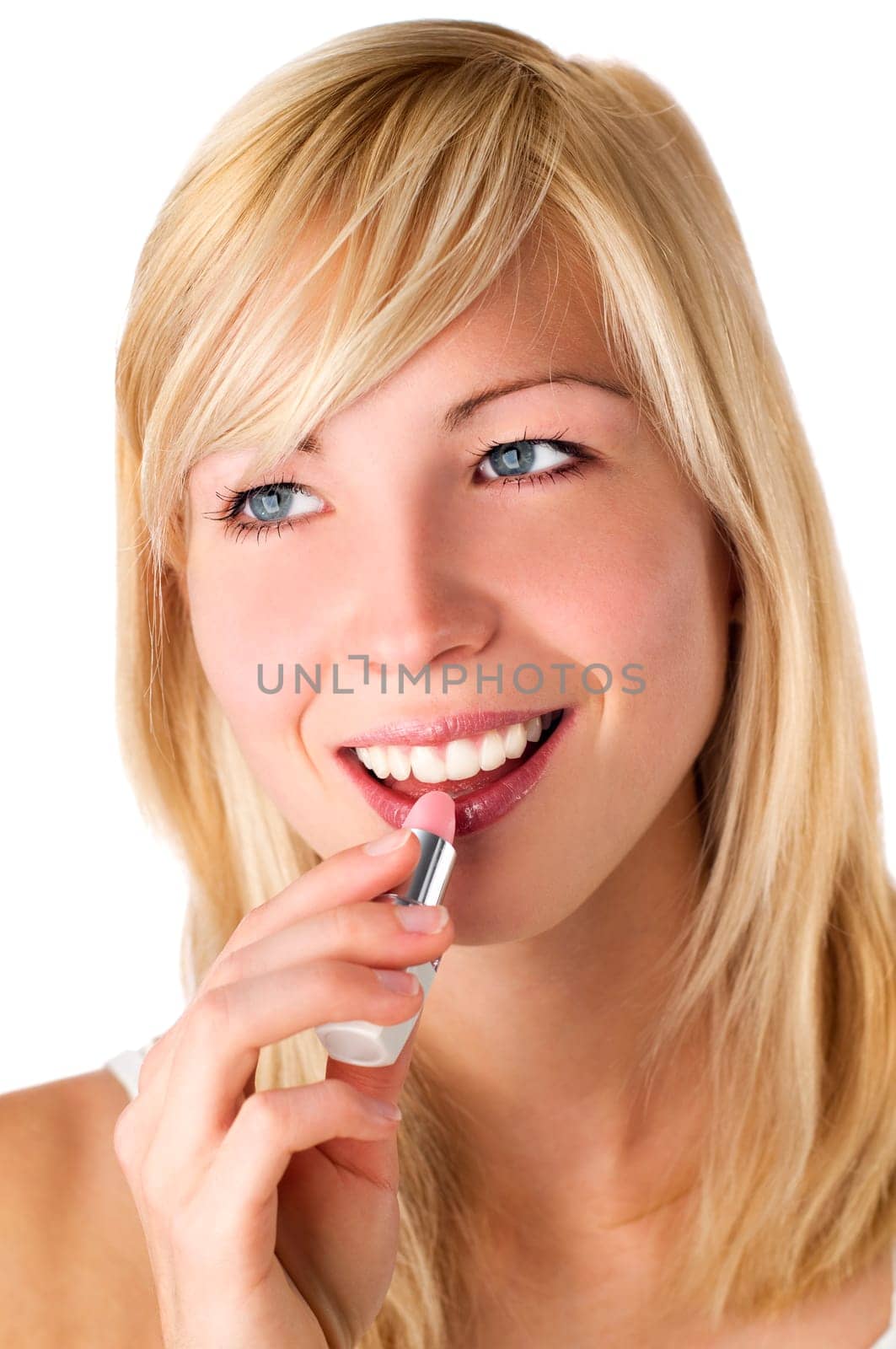 young woman applaying lipstick close up shoot