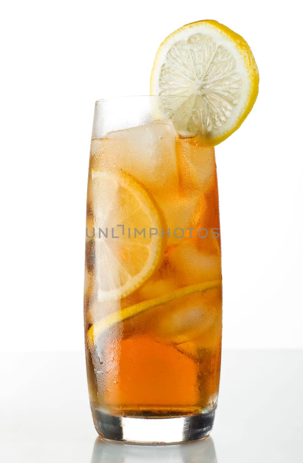 fresh cold ice tea with lemon close up