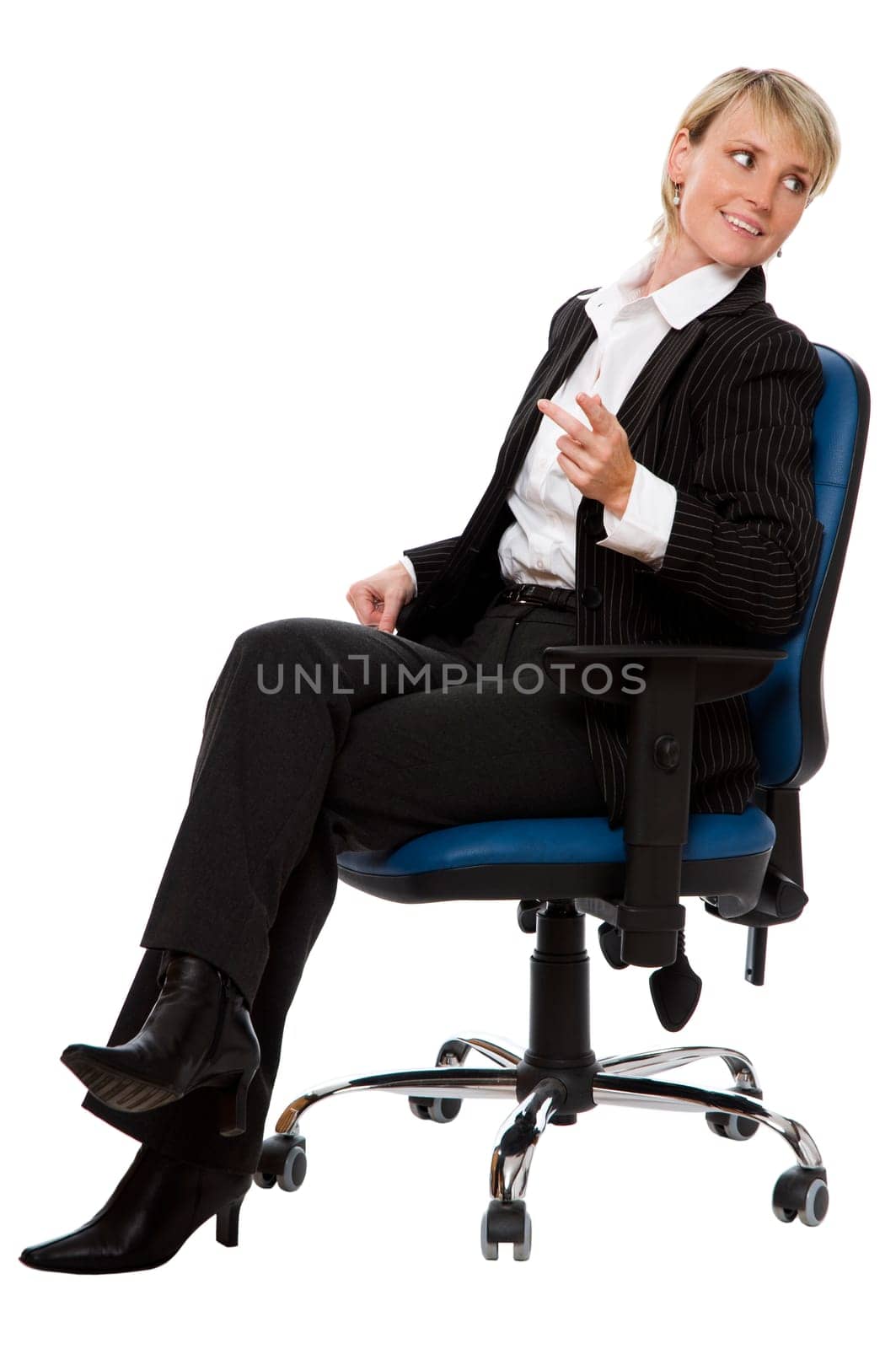 young blond business woman sitting in a chair