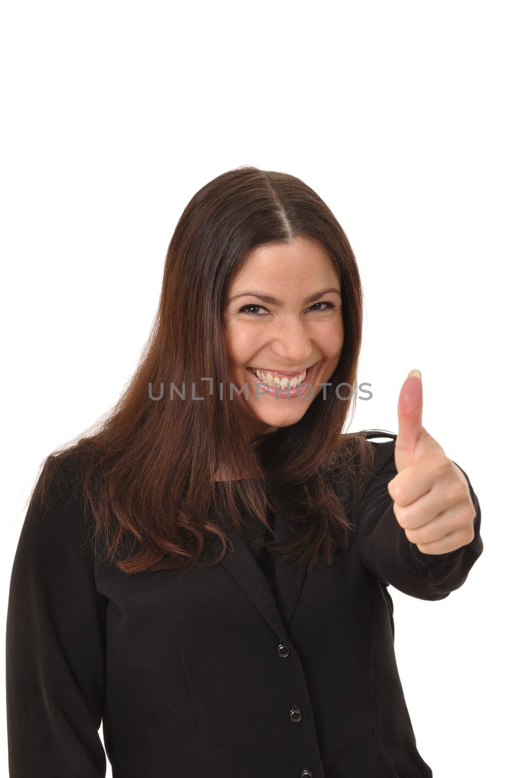 Smiling left-handed woman with thumbs up looking at camera