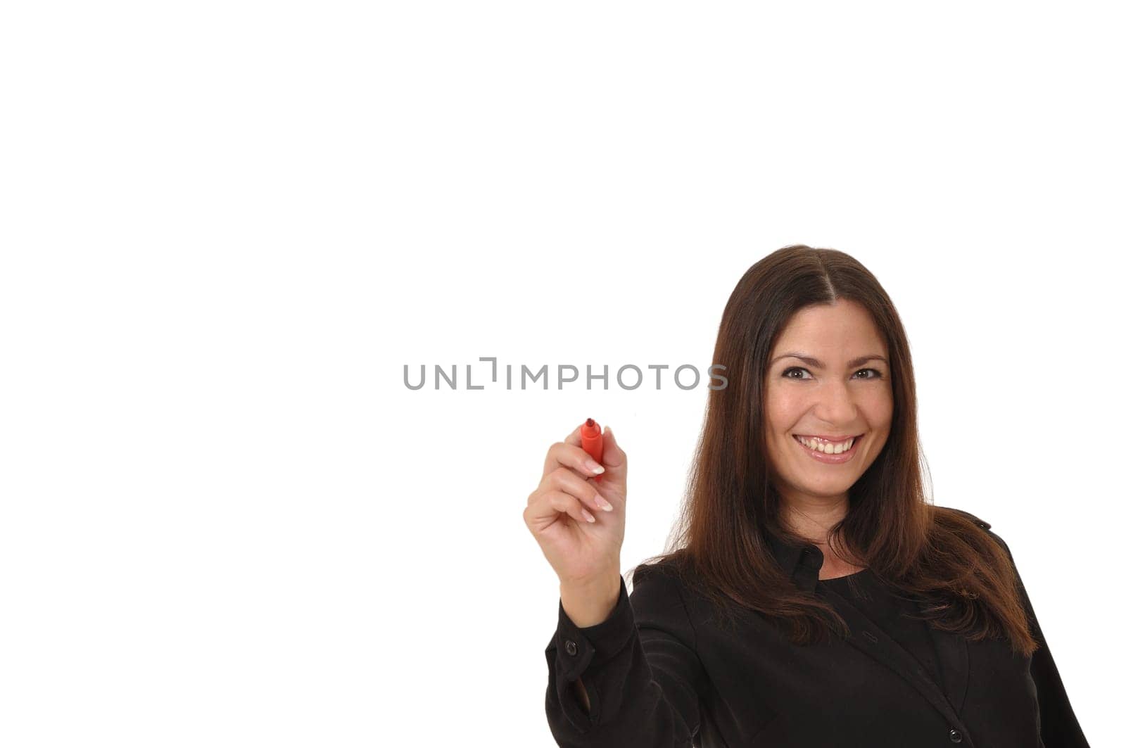 Attractive businesswoman writing a clue in the air