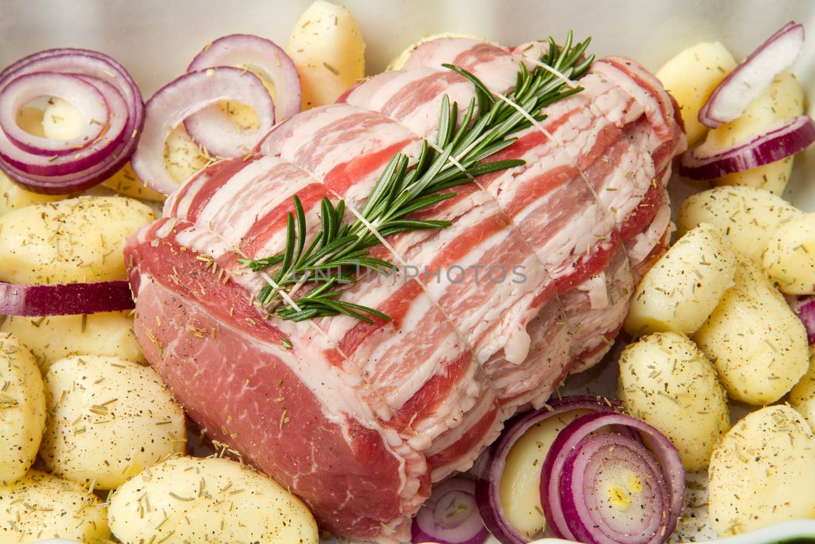 fresh roast of veal with rosemary and  potatoes