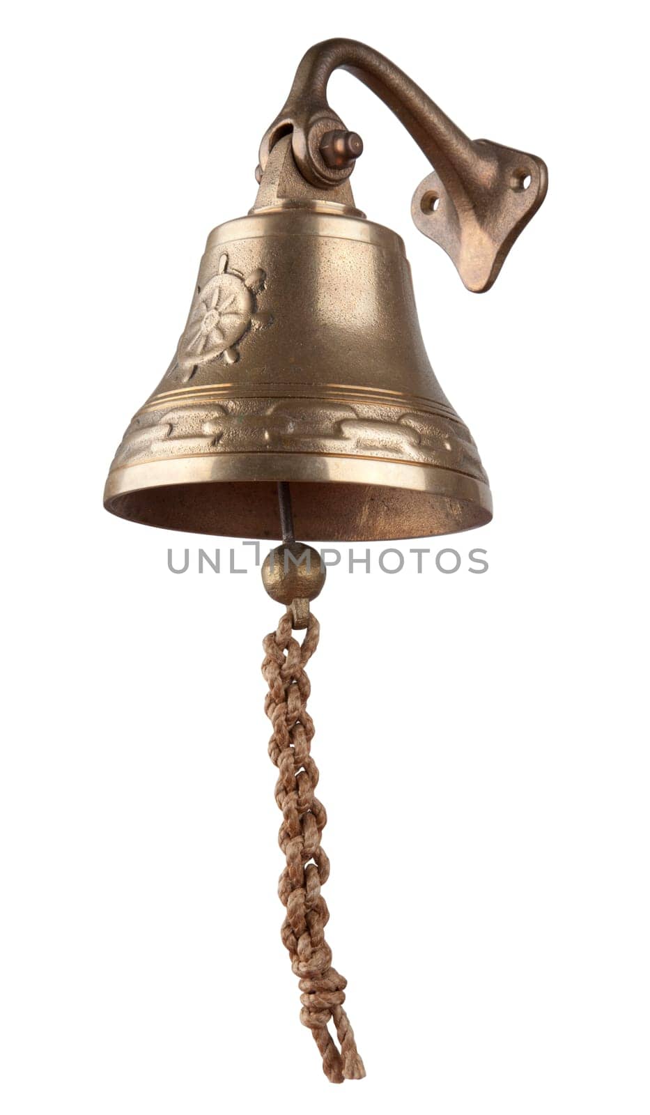Antique brass ship&#039 s bell with a rope on a white background