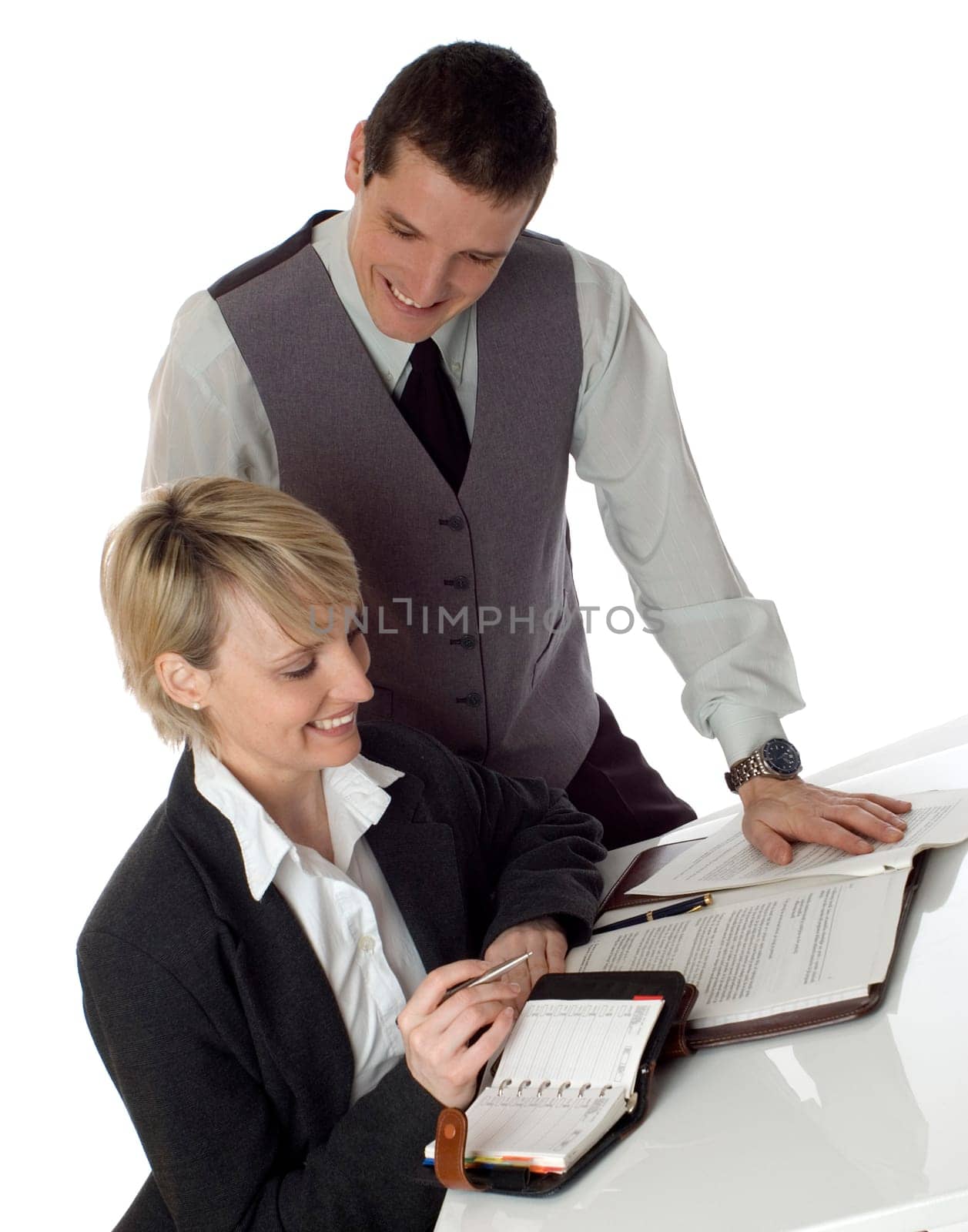 young business couple working in office on white