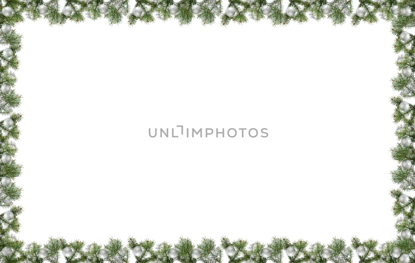 christmas frame made from pine branch and ornaments on white