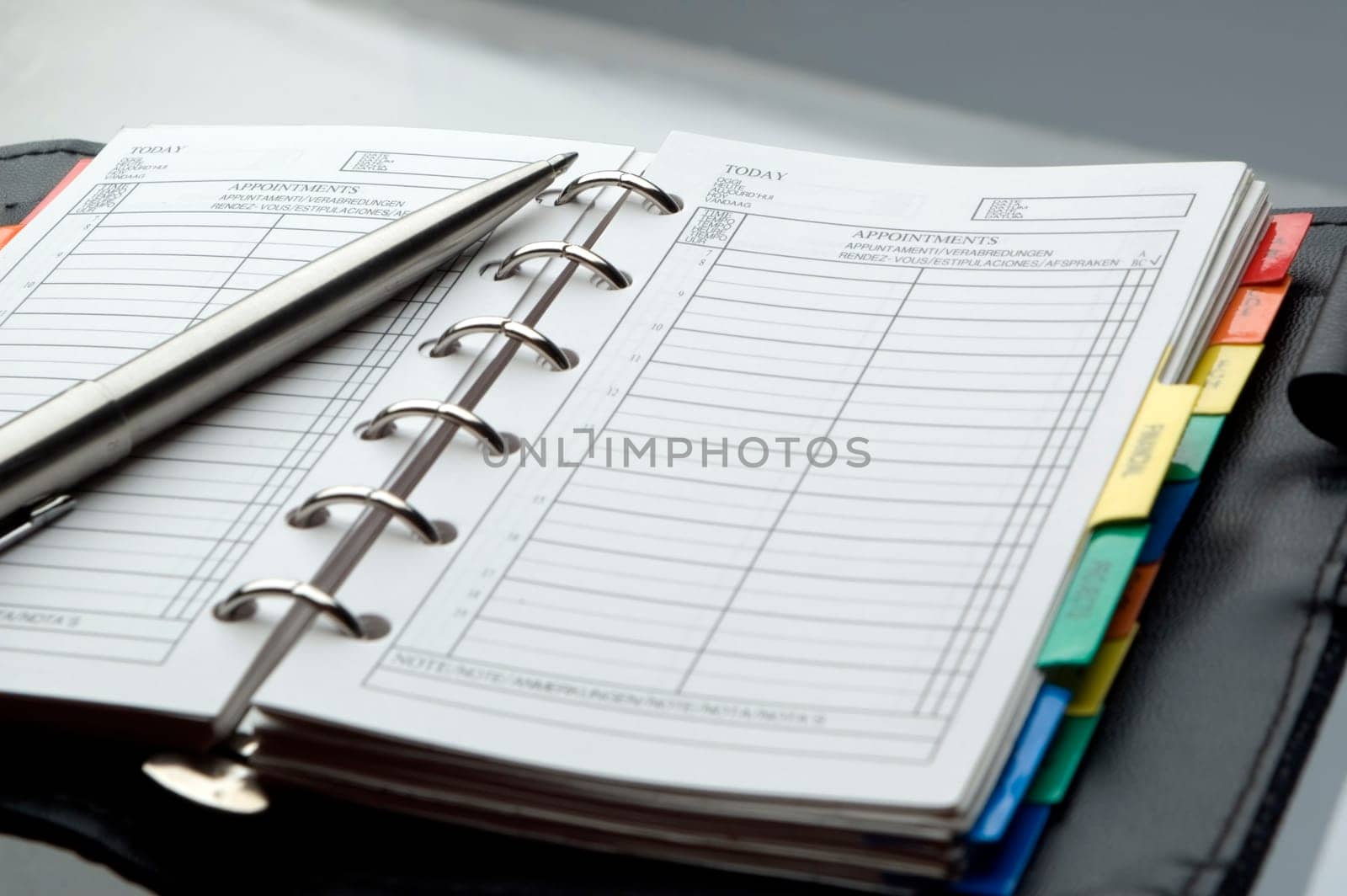 note book with pencil close up shoot
