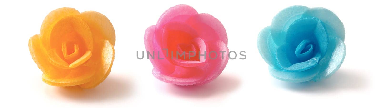 close up of wafer roses on white