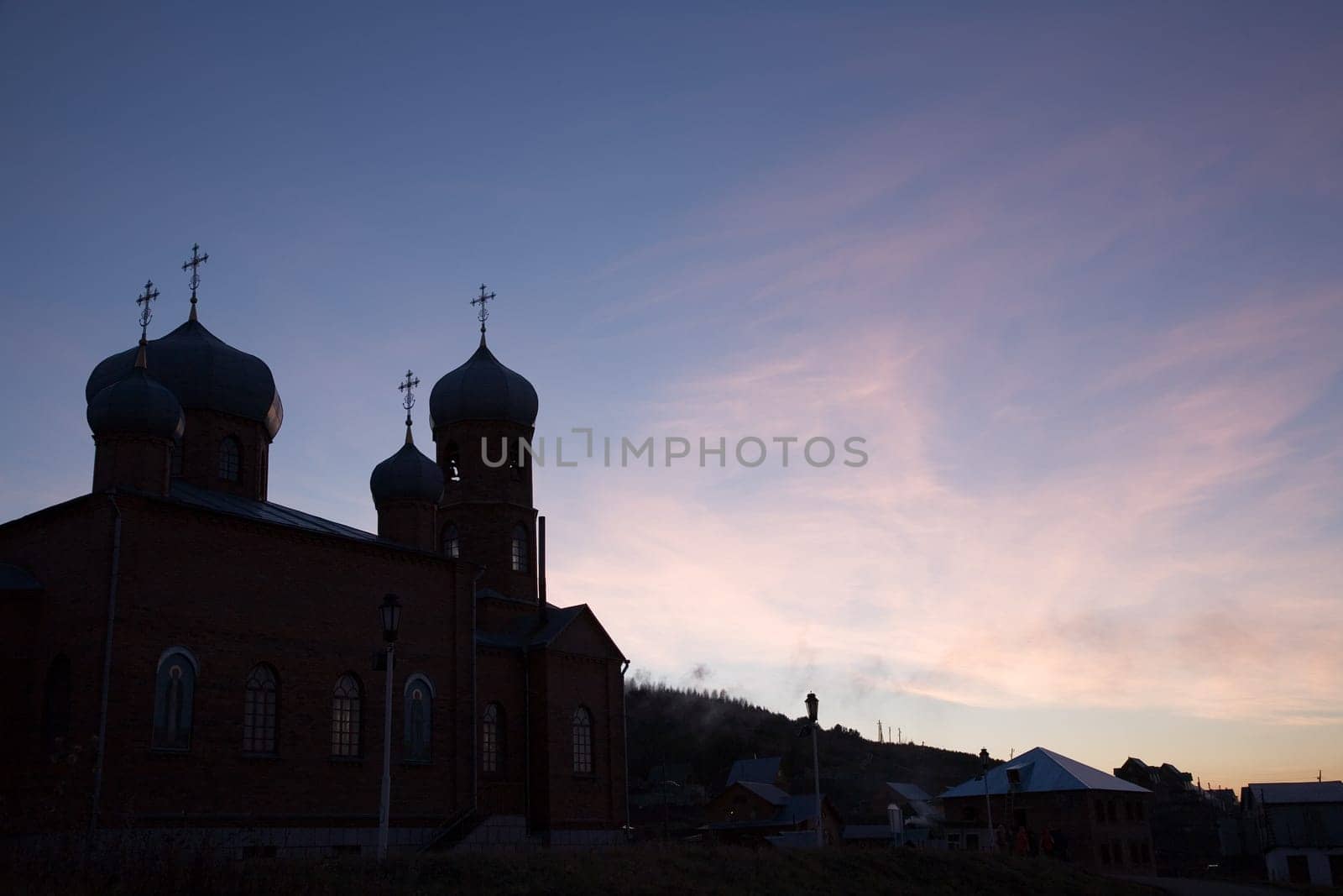 Church sunset background. Health-resort Belokurikha, november 2006