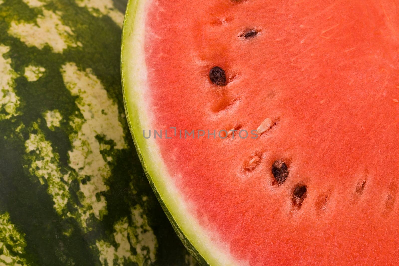 Fresh juicy watermelon, background fruit red and green