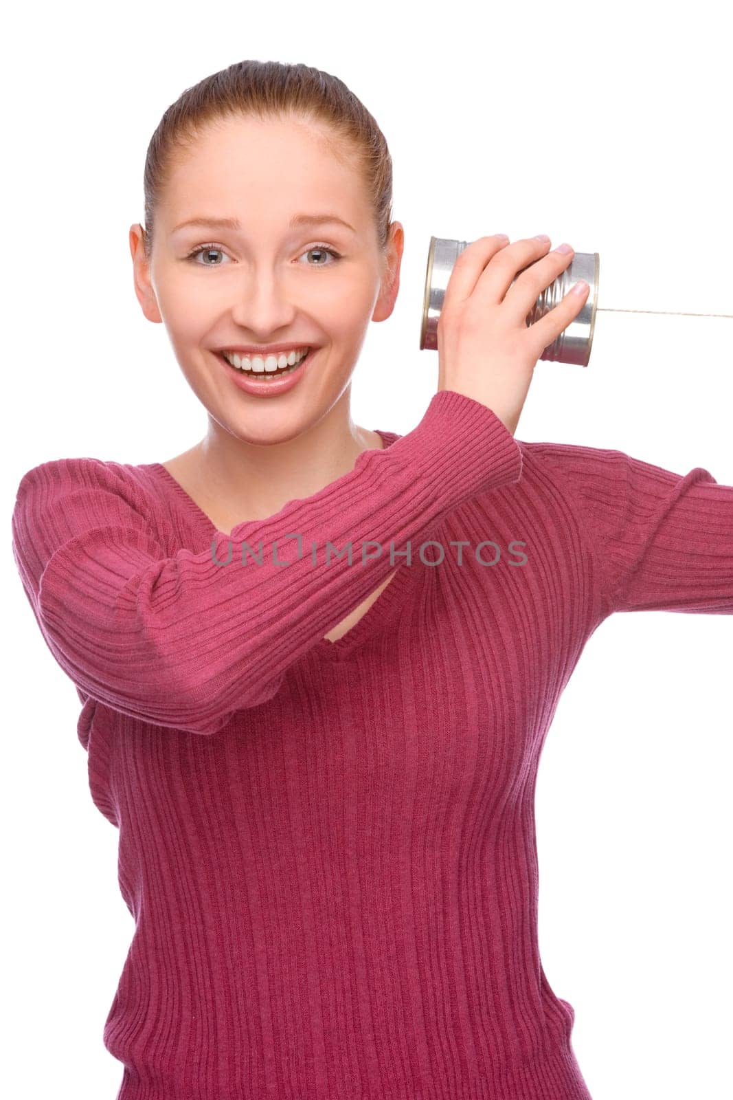 Studio shot of a young woman with a can phone