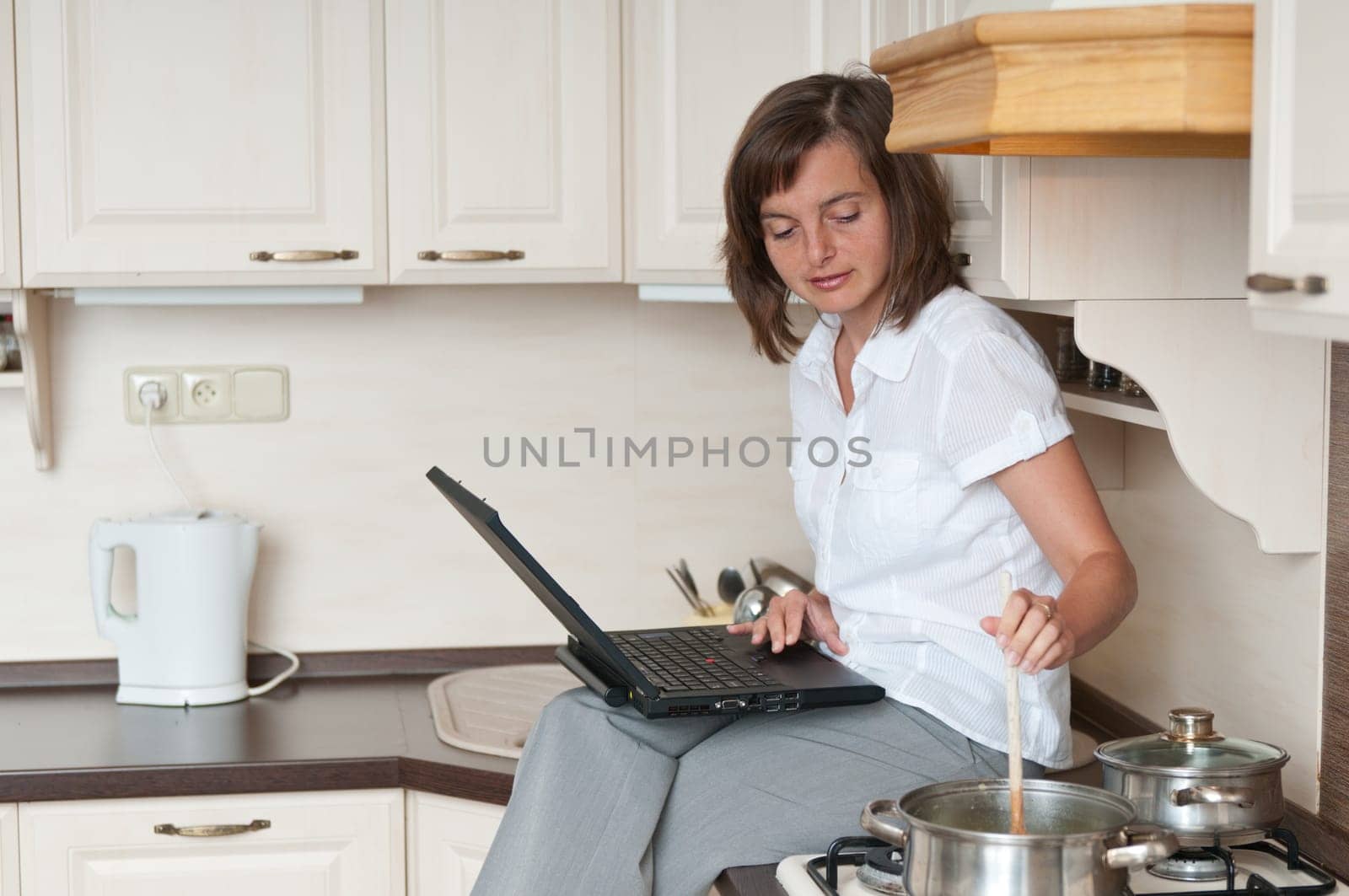 Multitasking - preparing meal and working