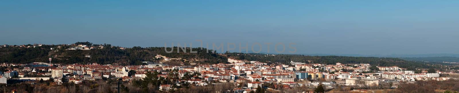stunning cityscape view of Ourém in Portugal (panoramic picture with blue sky)