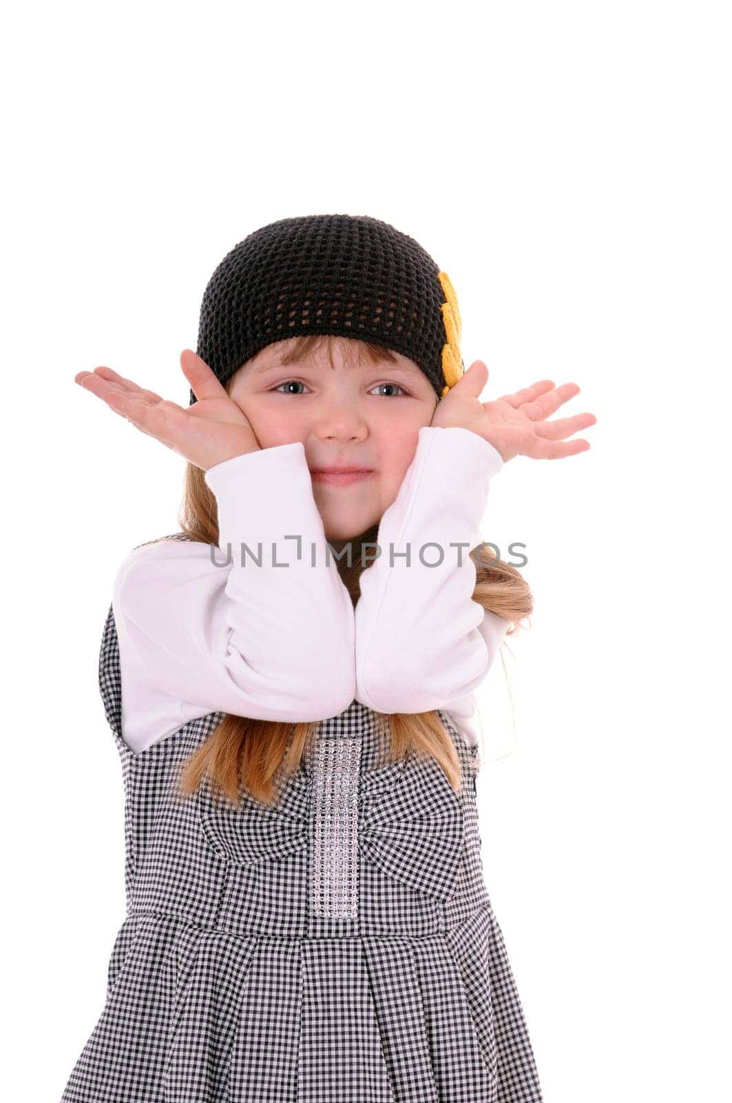 girl in a black knitted hat isolated on white background