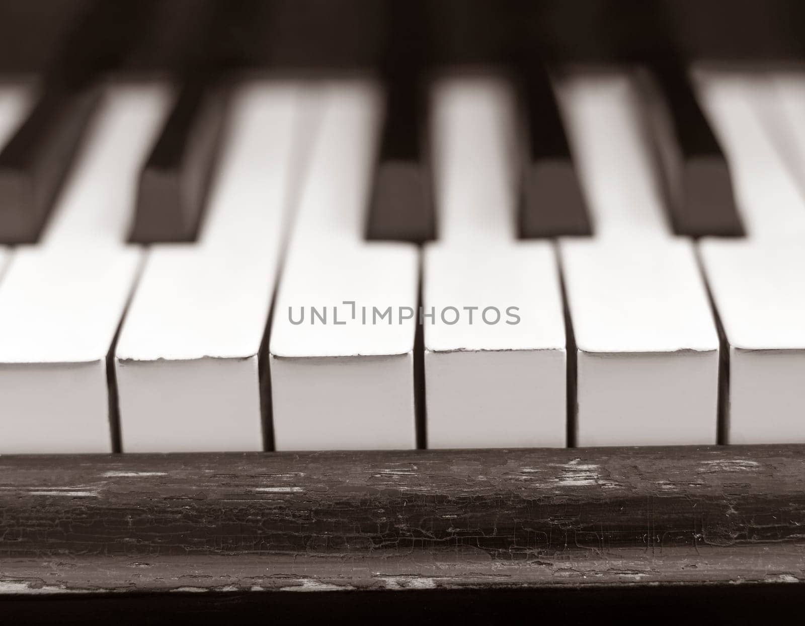 Close up of a worn piano