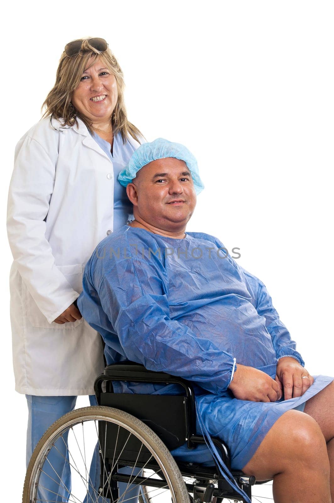 Large male patient in a wheelchair with doctor