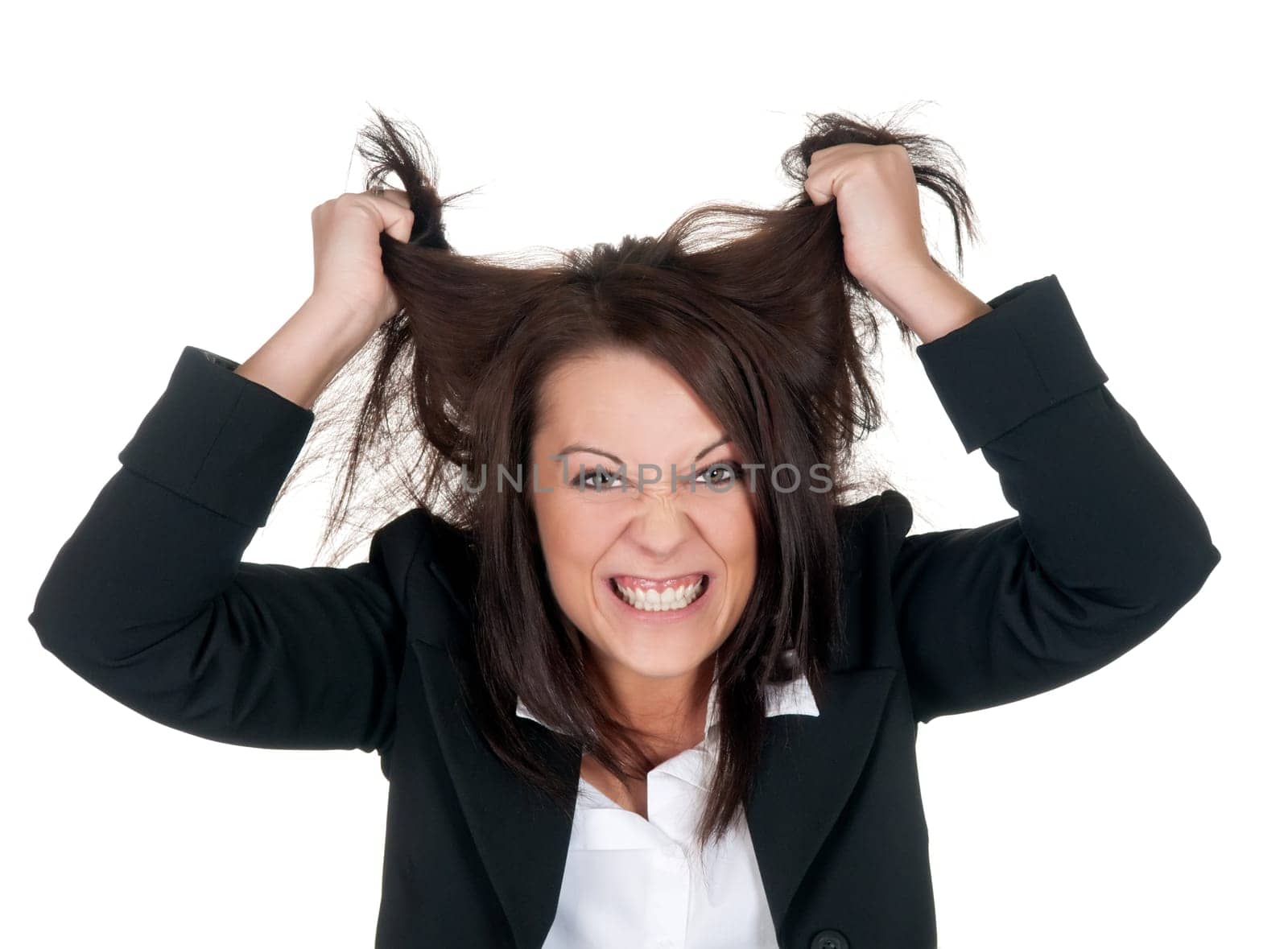 Businesswoman tearing her hair