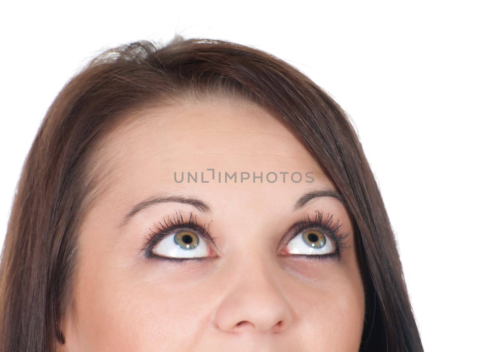 Young woman looking up