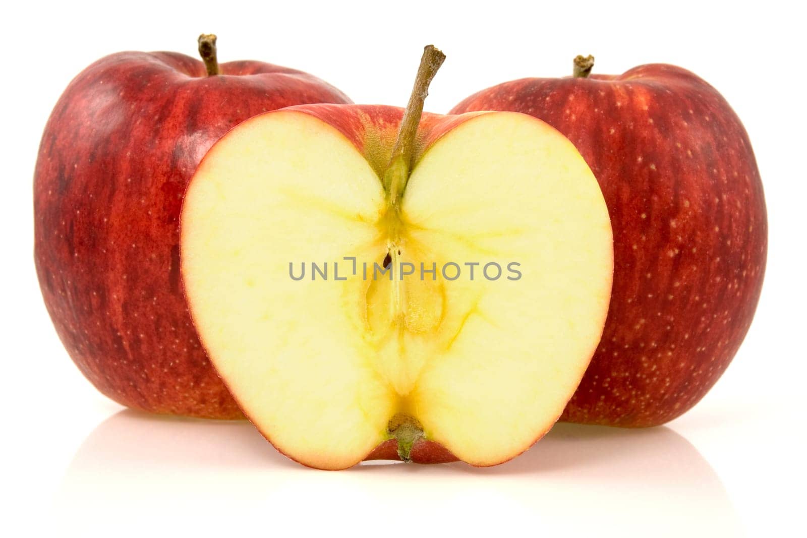 red apples with reflection on white background