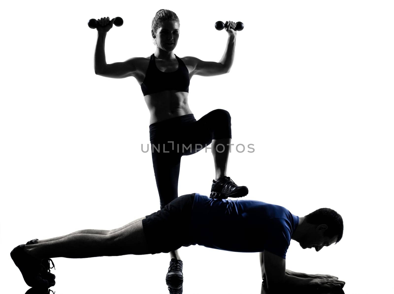 couple woman man exercising workout fitness aerobics posture in silhouette studio isolated on white background