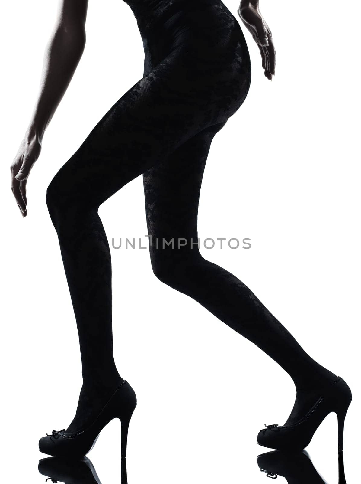 one woman legs silhouette on studio isolated white background