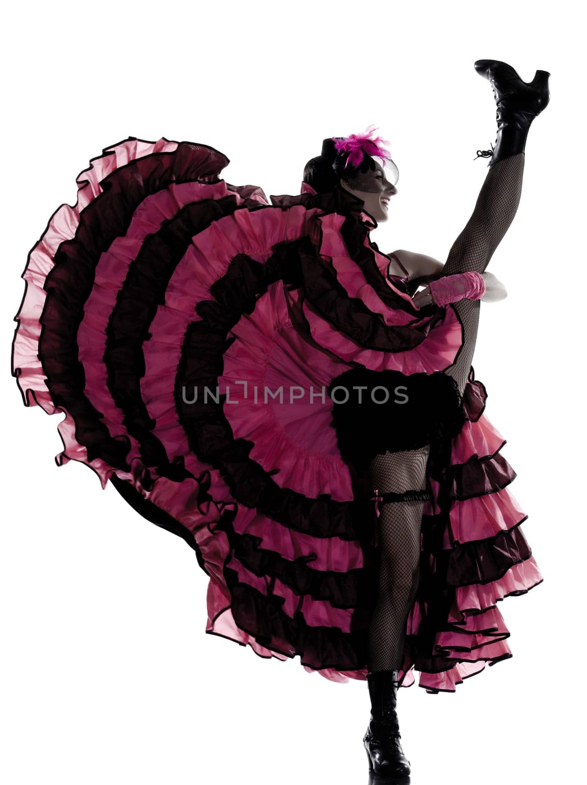 woman dancer dancing french cancan in studio isolated on white background